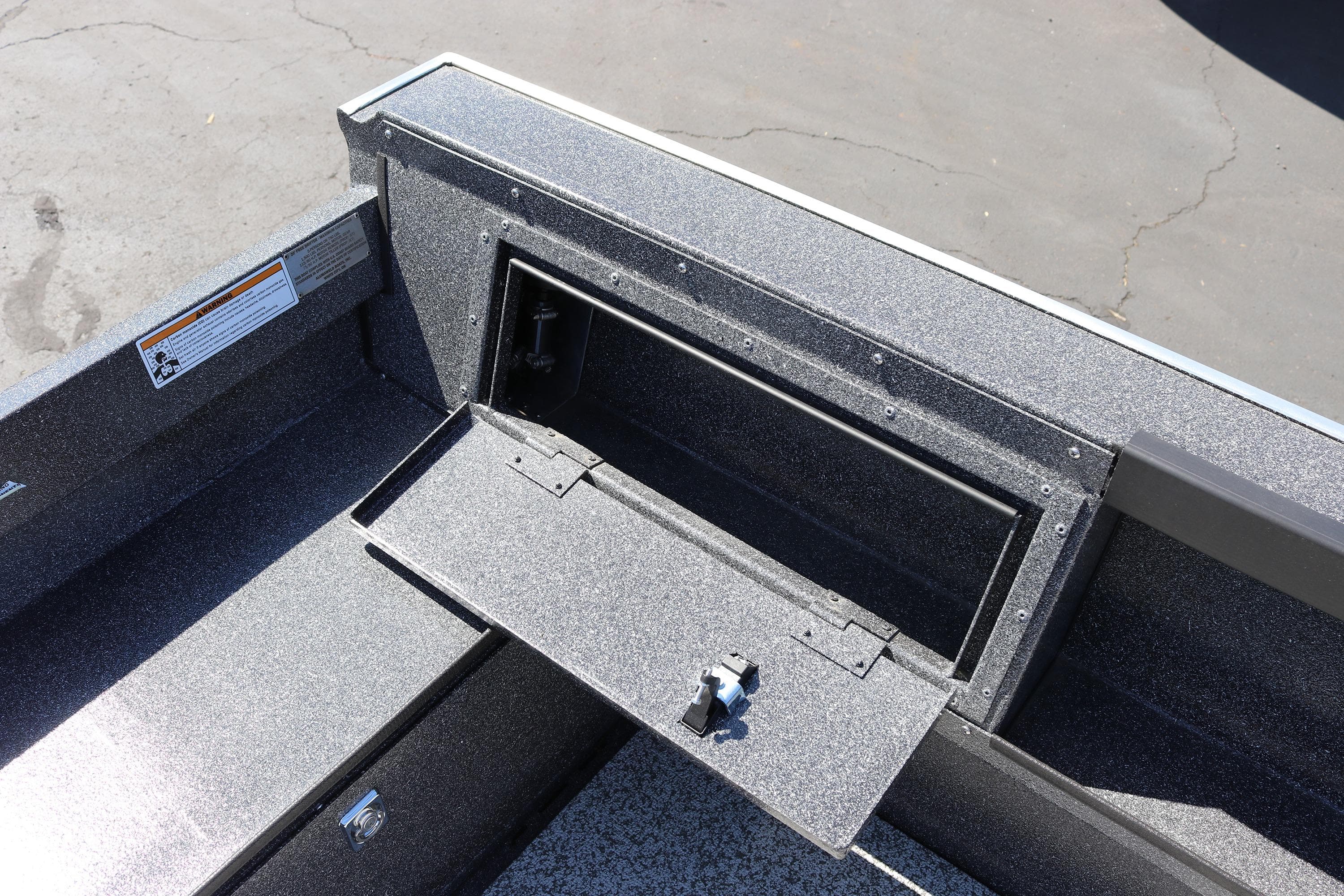 2025 Alumaweld Free Drifter 20 boat storage compartment with open hatch.