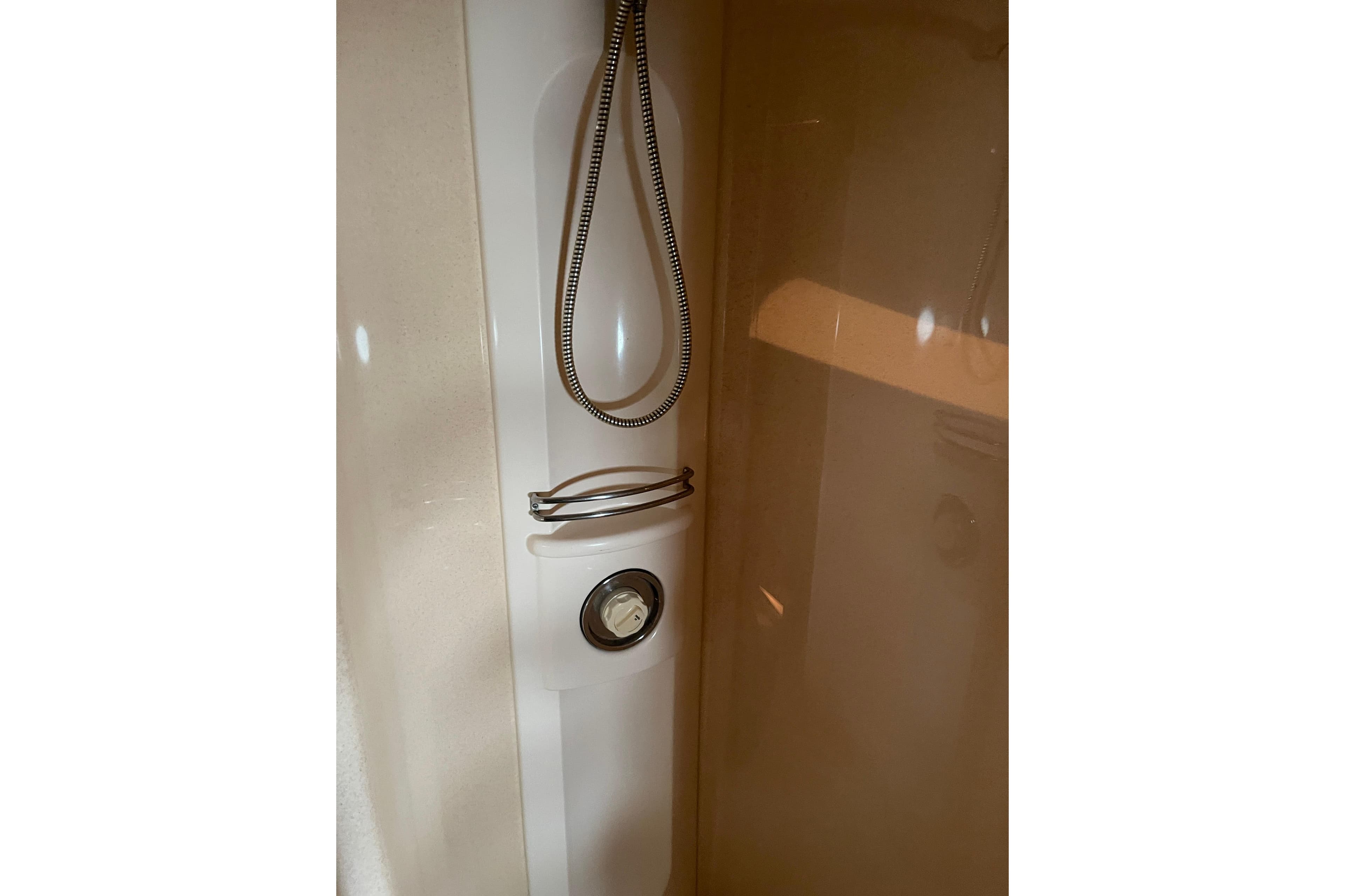 Shower area in 2000 Azimut 46 Flybridge MY yacht, featuring sleek design and modern fixtures.