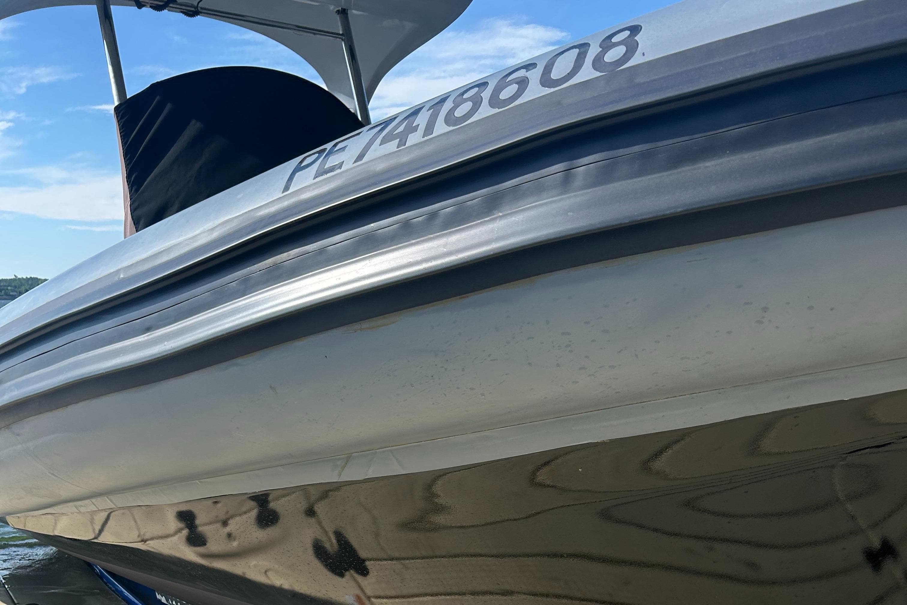 2008 RIB U-23 Carbon Hull boat with visible registration number on the side.