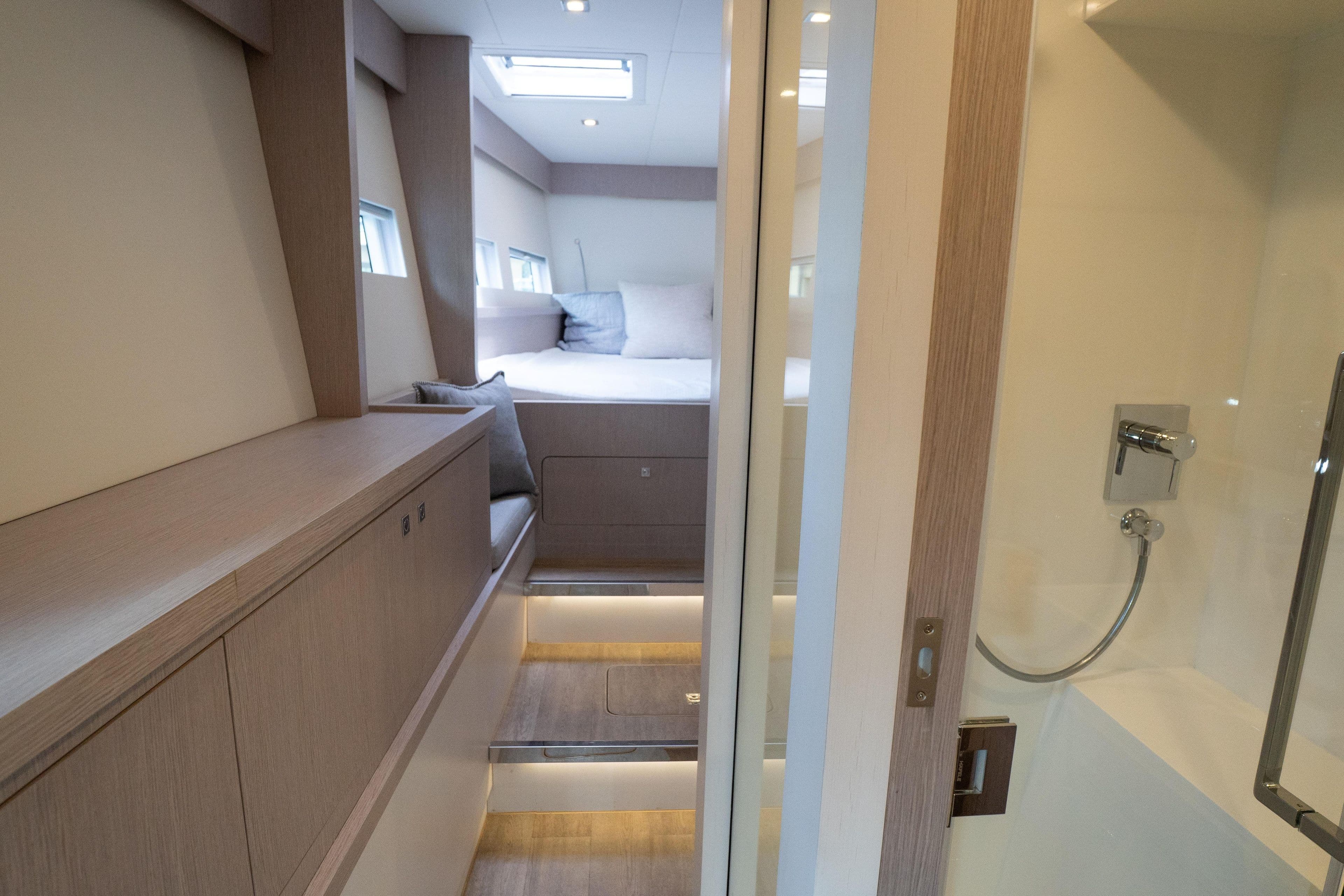 Interior of 2023 Alva Yachts Ocean Eco 54, featuring a cozy cabin and modern bathroom.