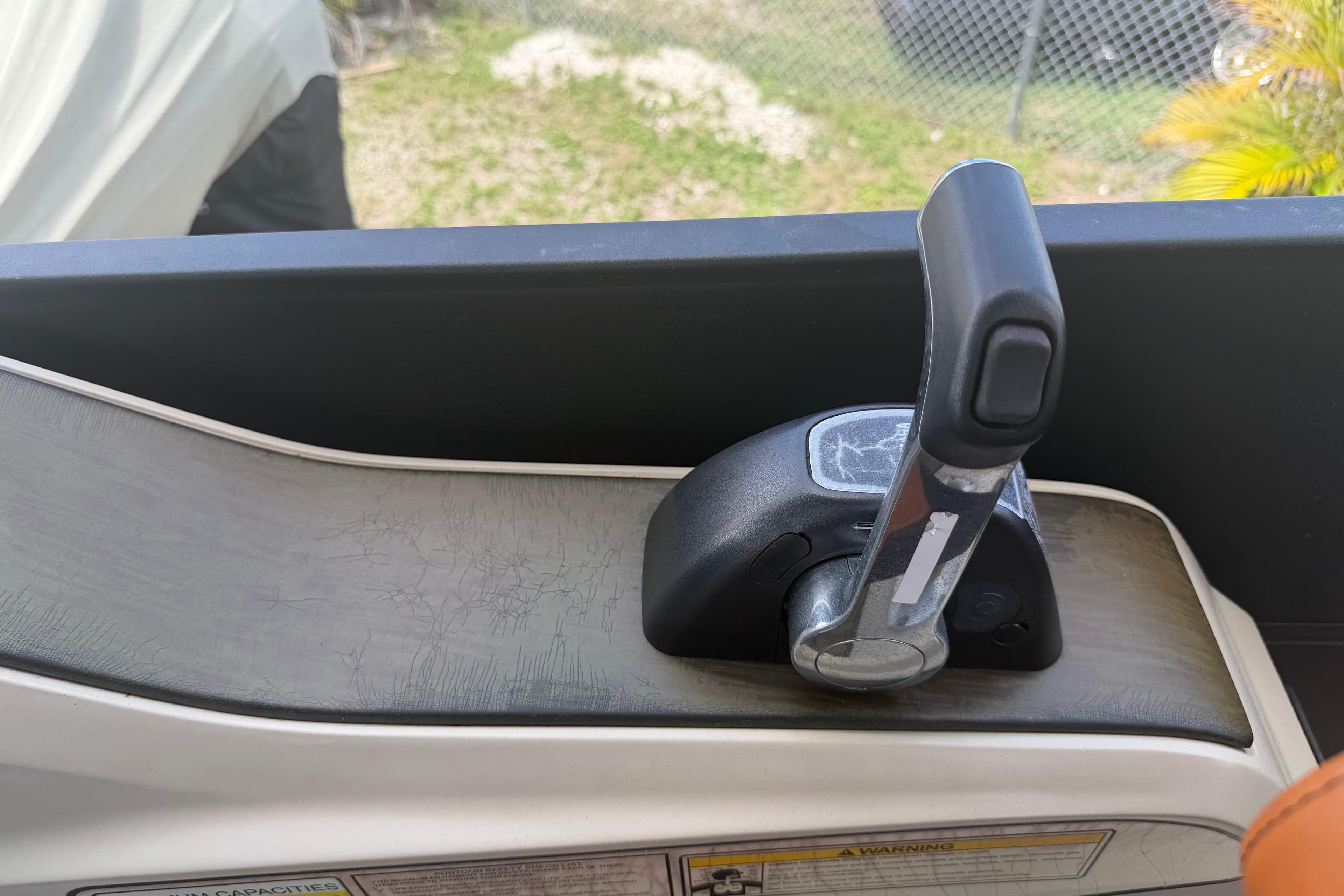 Throttle control lever on a 2015 Premier 290 Grand View boat.