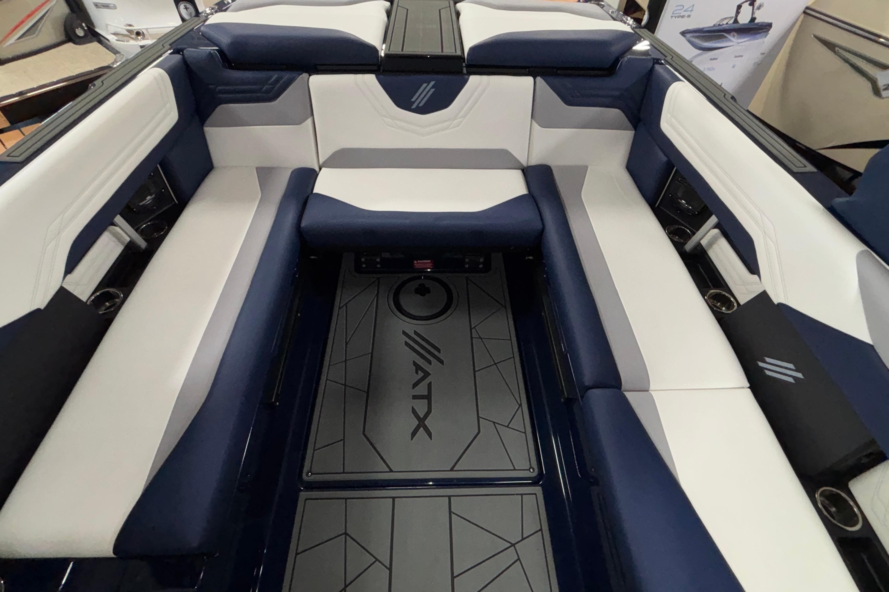 2026 ATX Surf Boats 24 Type-S interior with blue and white seating.