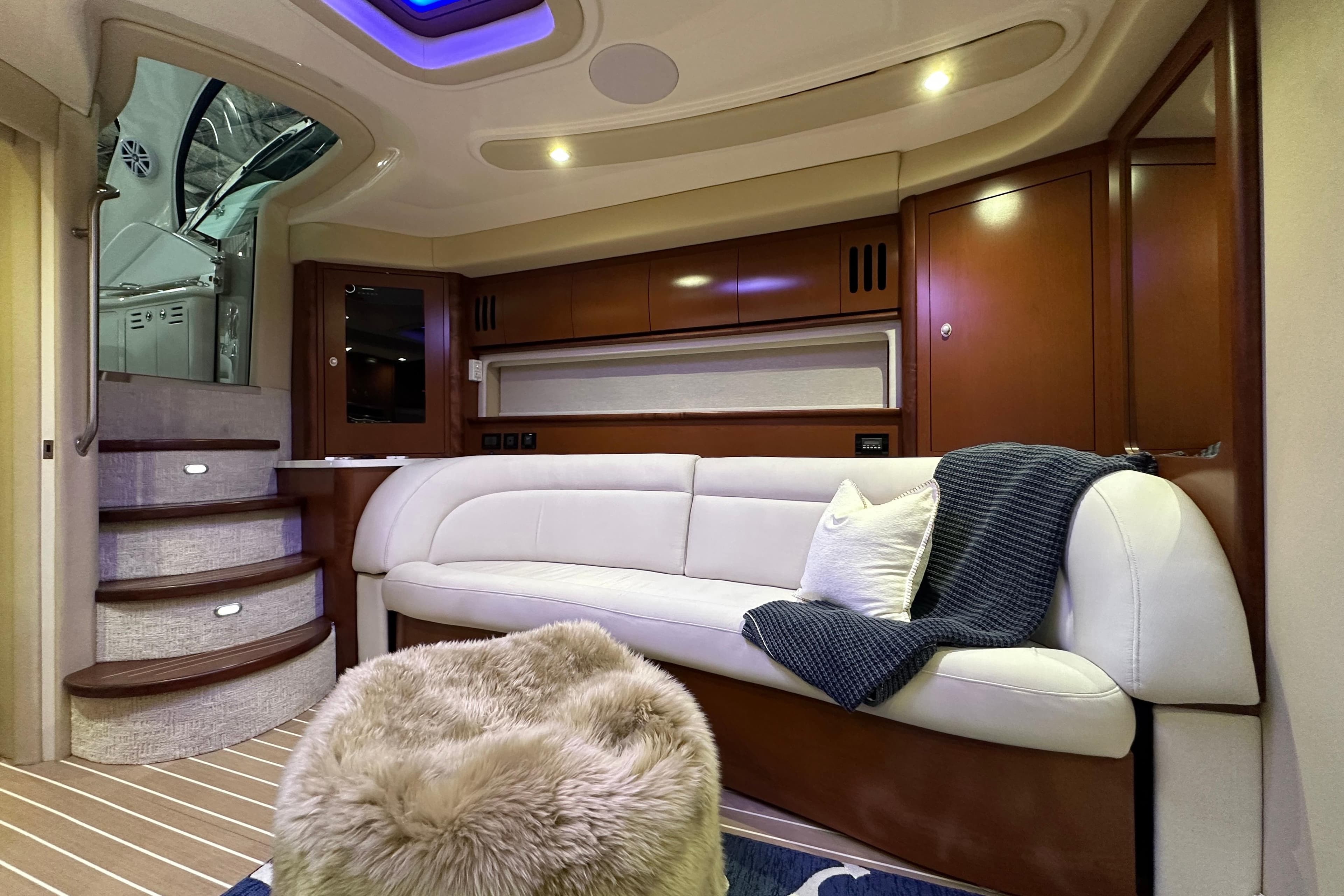 Luxurious interior of 2007 Sea Ray 44 Sundancer yacht with plush seating and elegant design.