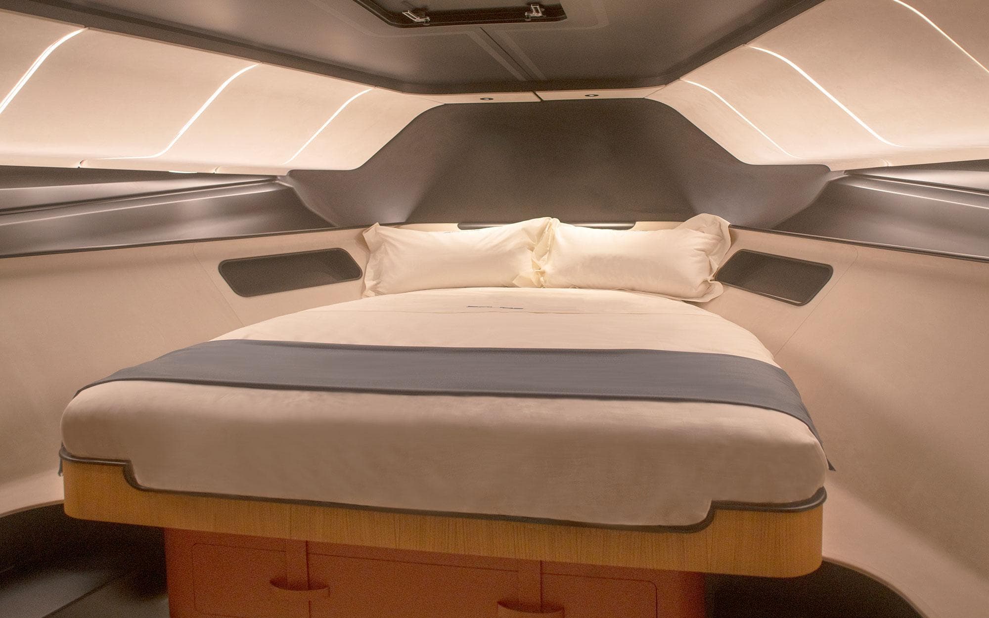 Luxurious interior cabin of 2023 Bolide 80 yacht with modern design and comfortable bedding.