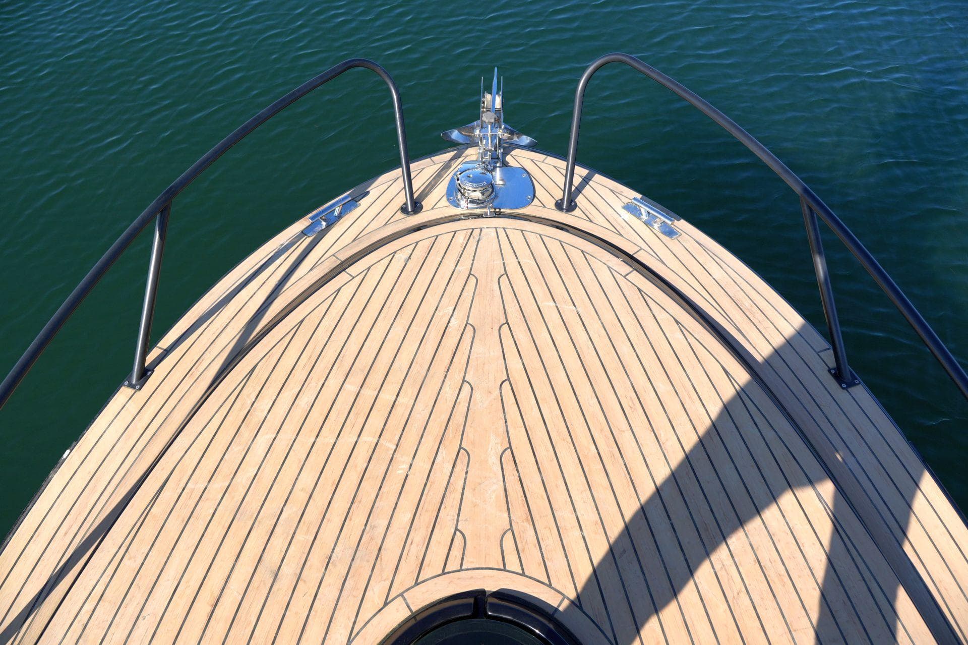 Foredeck of a 1978 Coronet 22 DC on calm water.