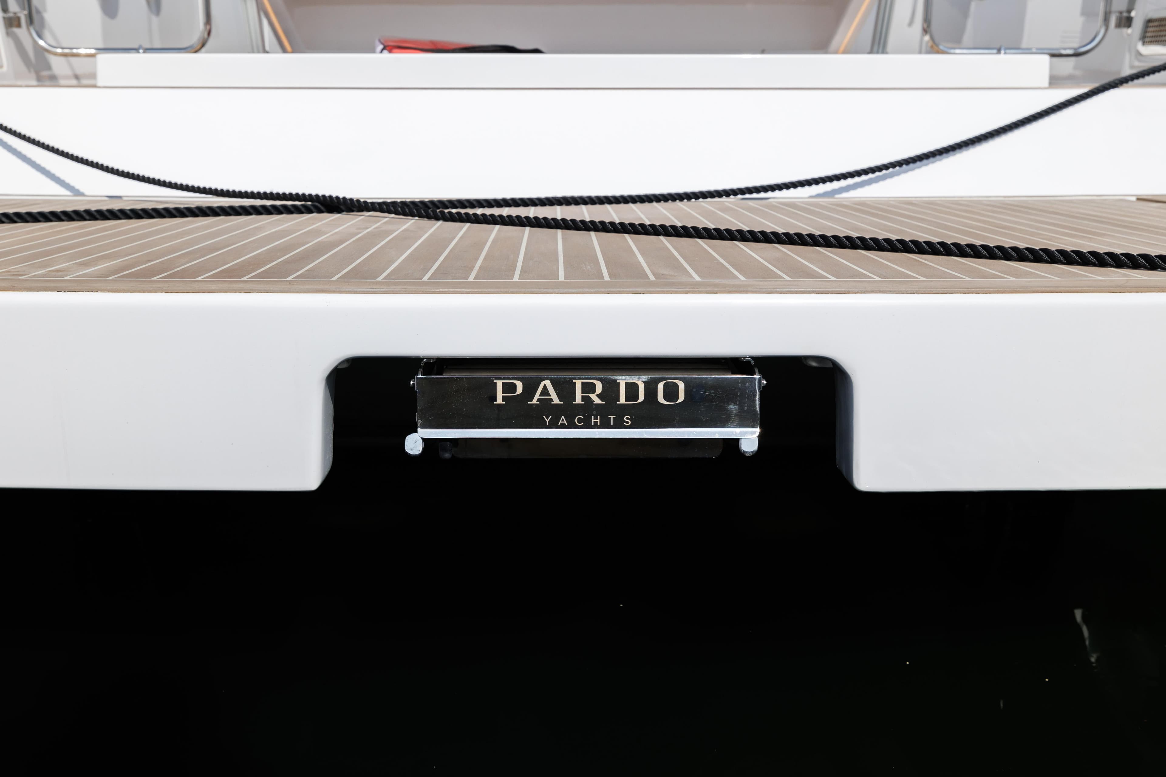 2024 Pardo Yachts 43 stern view with logo and teak deck.