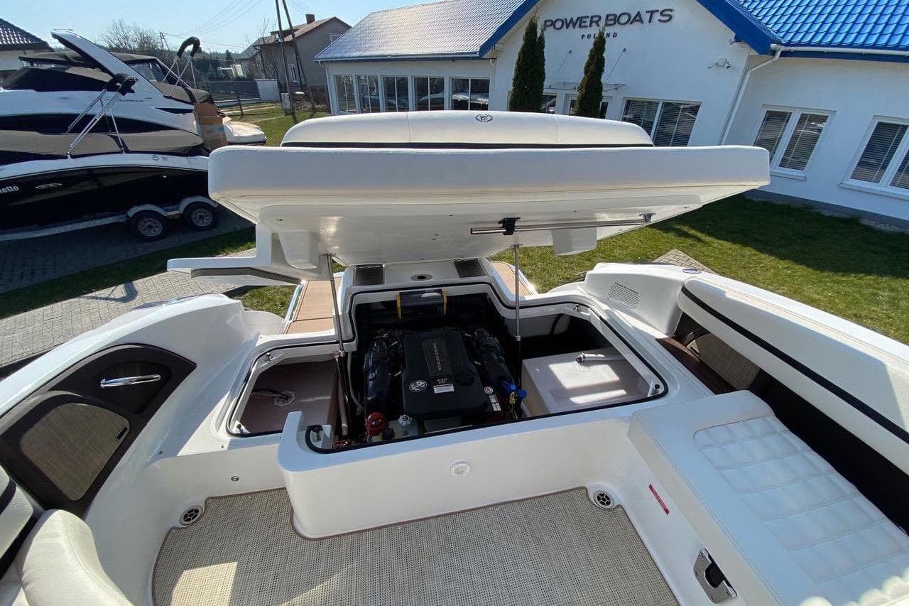 2020 Cobalt R7 Surf boat engine compartment open, showcasing interior mechanics at Power Boats Poland.