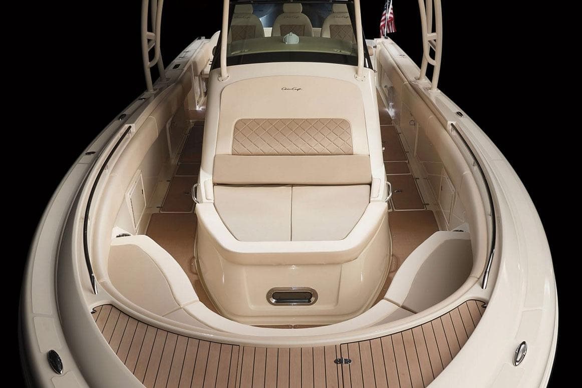 Manufacturer Provided Image: 2018 Chris-Craft Catalina 34 boat interior with luxurious seating and teak flooring.