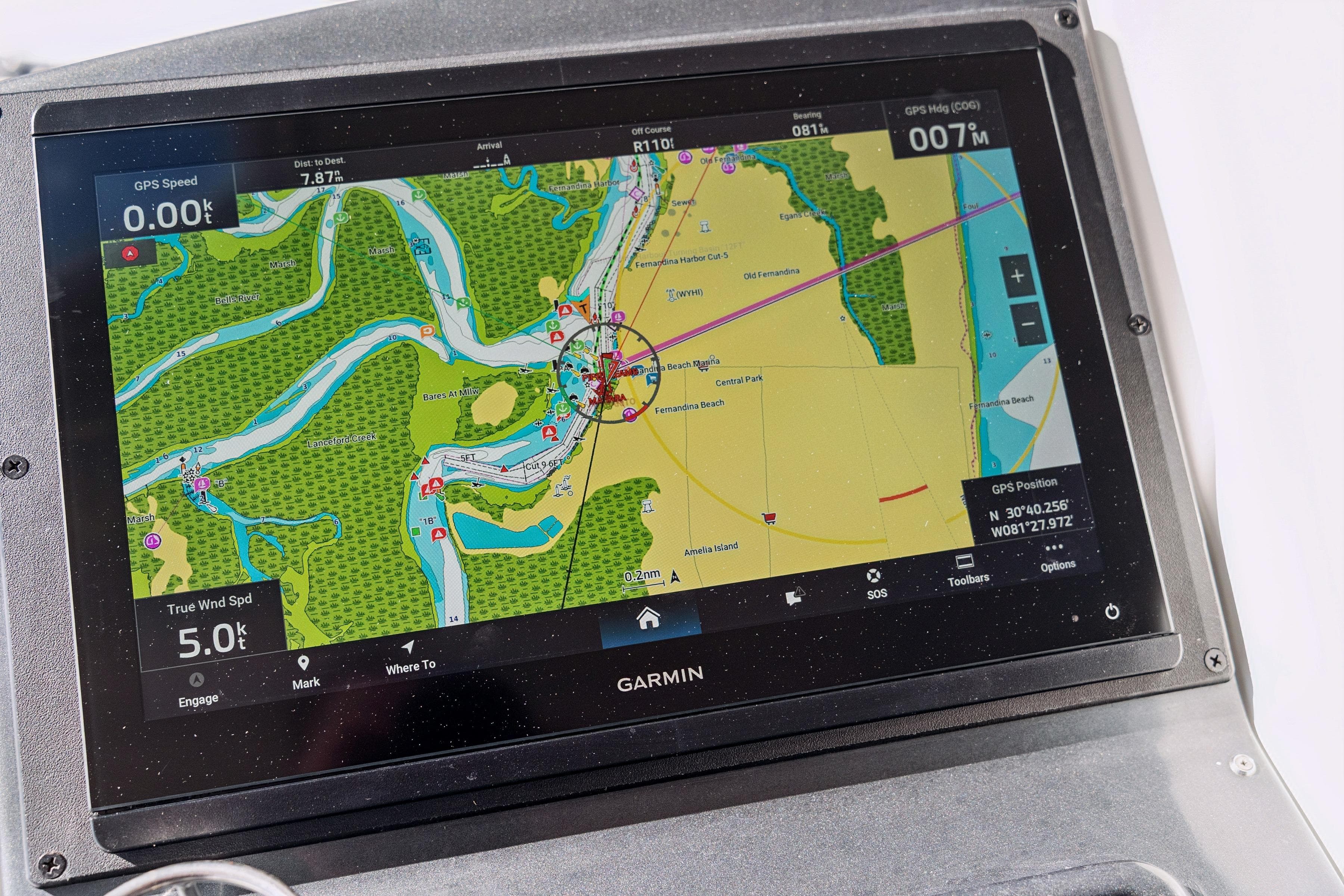 Garmin navigation display on a 2012 Lagoon 560 yacht, showing detailed nautical map.