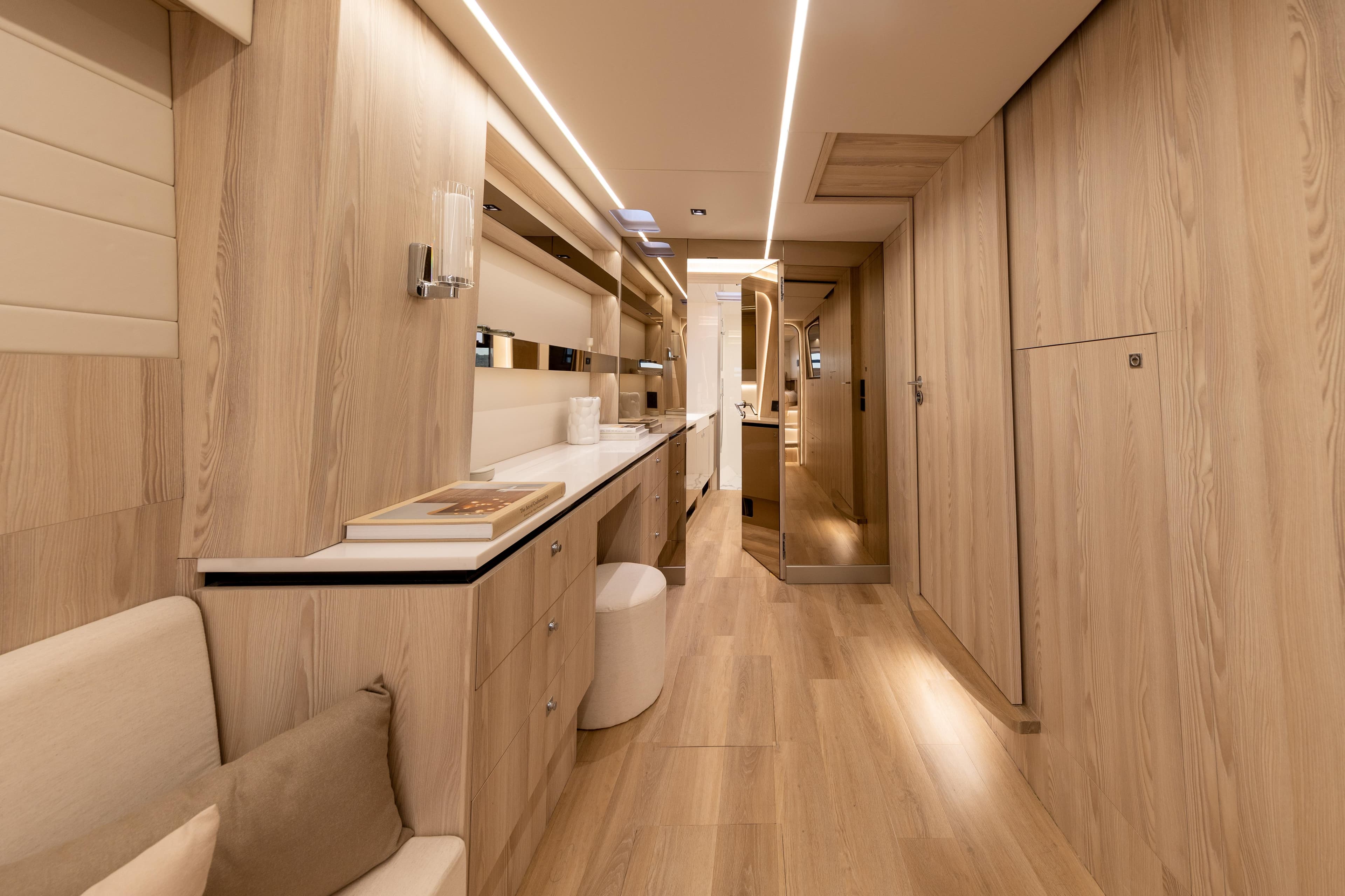 Luxurious interior of 2026 Omaya 50 yacht with modern wood finishes and sleek design.