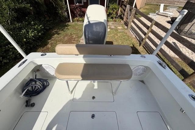 2017 Stuart 27 boat interior with seating and storage compartments.