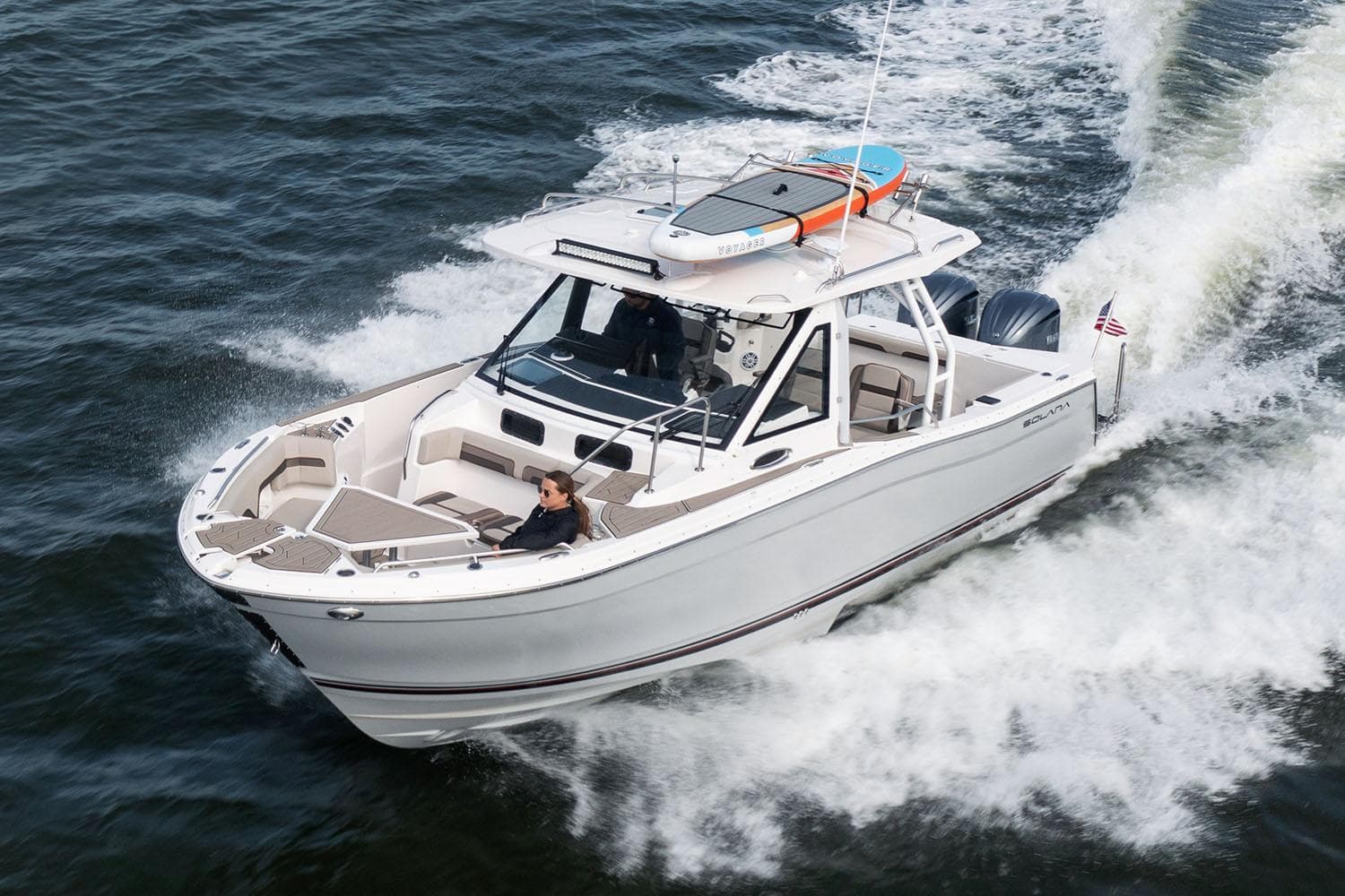 Manufacturer Provided Image: 2025 Solara S-310 CW boat cruising on open water, featuring sleek design and modern amenities.