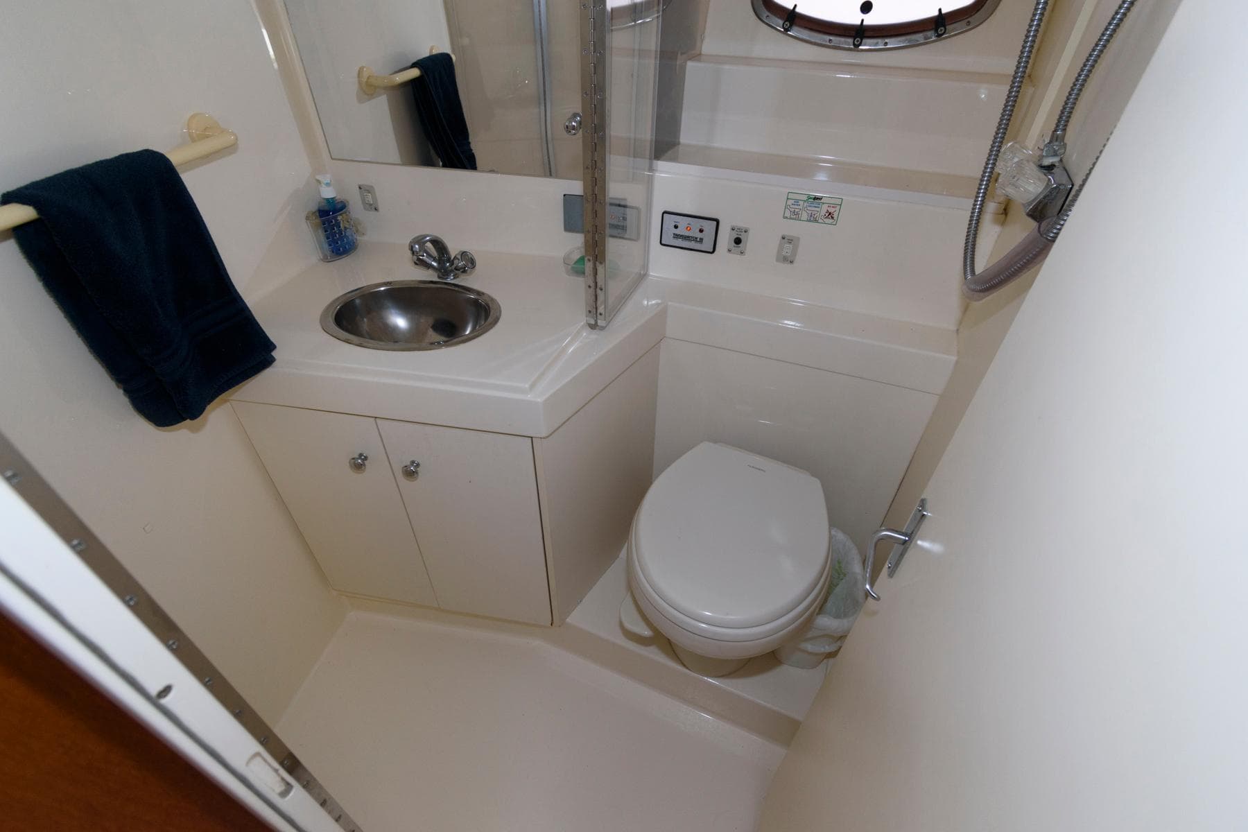 Interior view of 1997 Carver 400 Yacht bathroom.