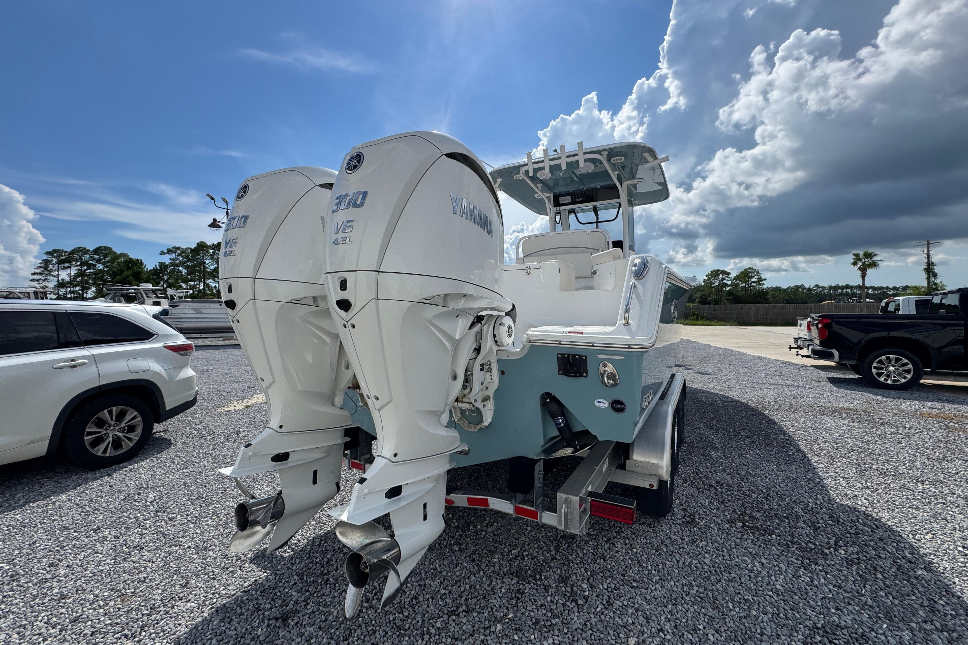 2023 Sea Hunt Gamefish 30 Coffin Box with dual Yamaha outboard engines.