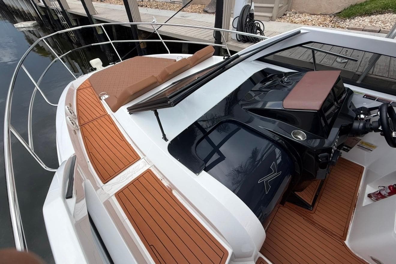 2025 NX Boats 340 Sport Coupe with sleek design and luxurious deck features.