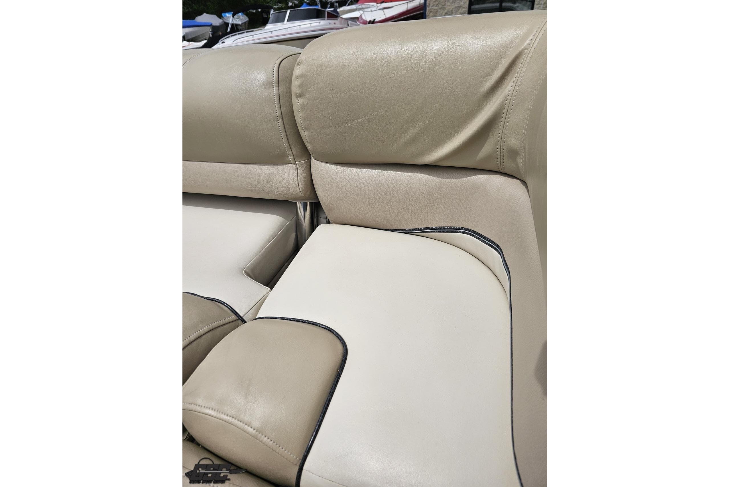 Beige leather seating on 2012 Harris FloteBote 230 Grand Mariner SEL pontoon boat.