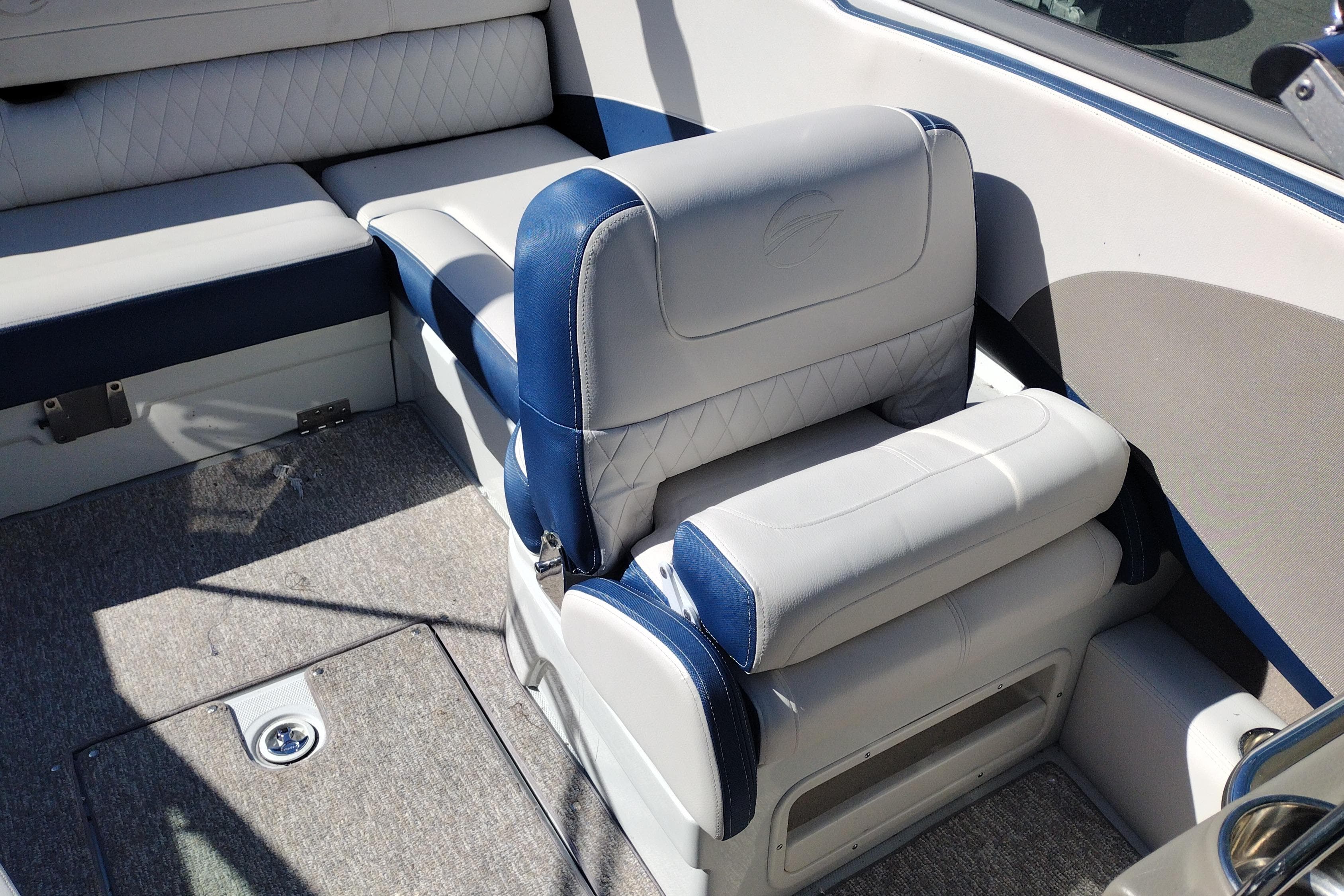 2017 Crownline 225 SS boat interior with blue and white seating.