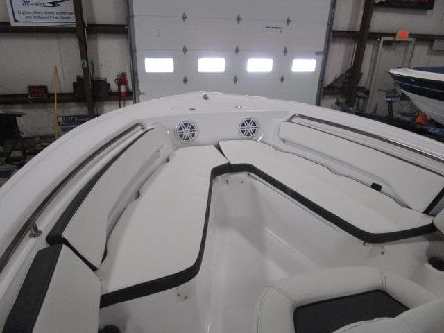2025 Tidewater 198 CC Adventure boat interior with white seating and speakers.