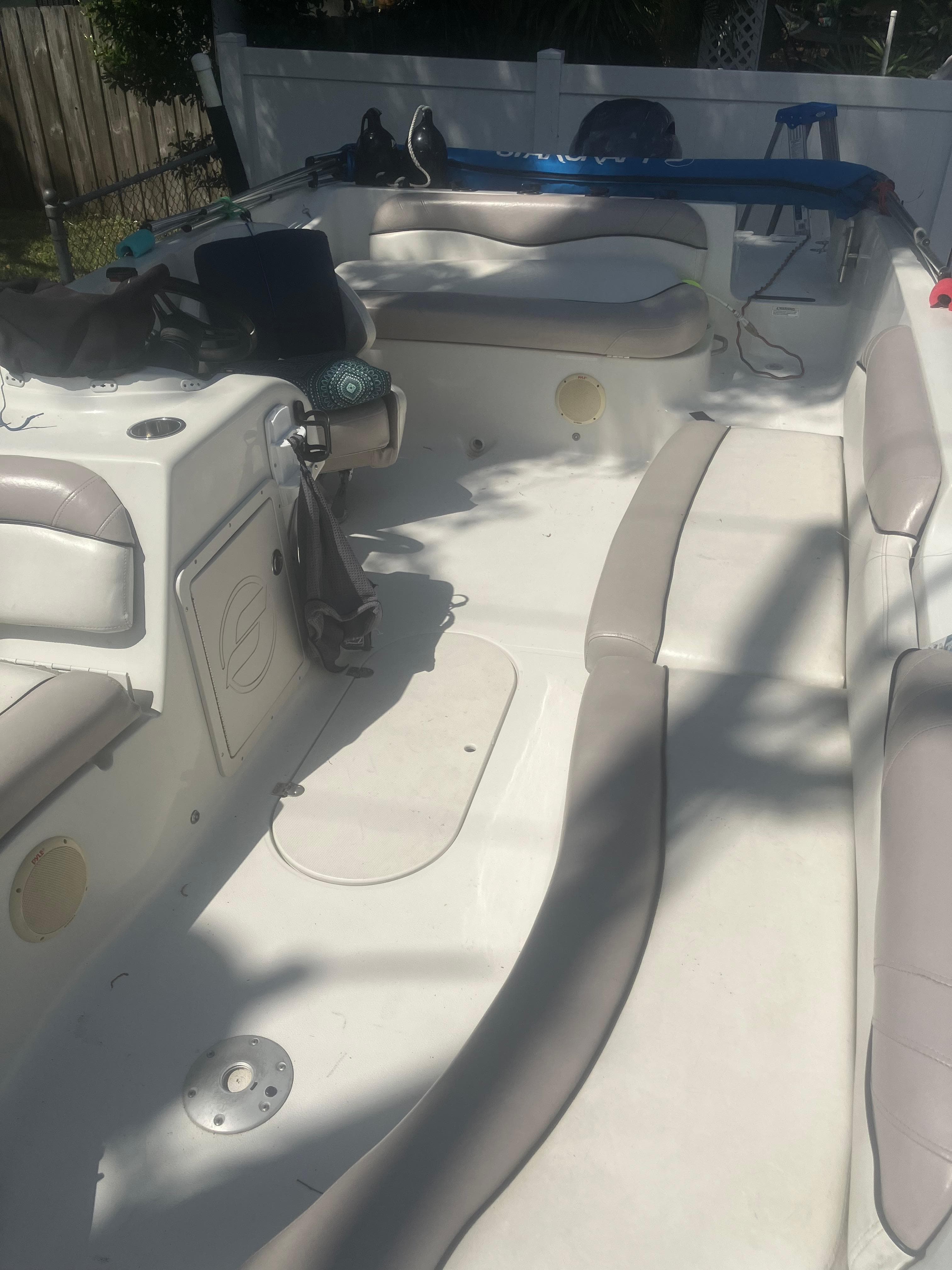 2018 Starcraft Limited 2000 OB Fish boat interior with seating and storage.