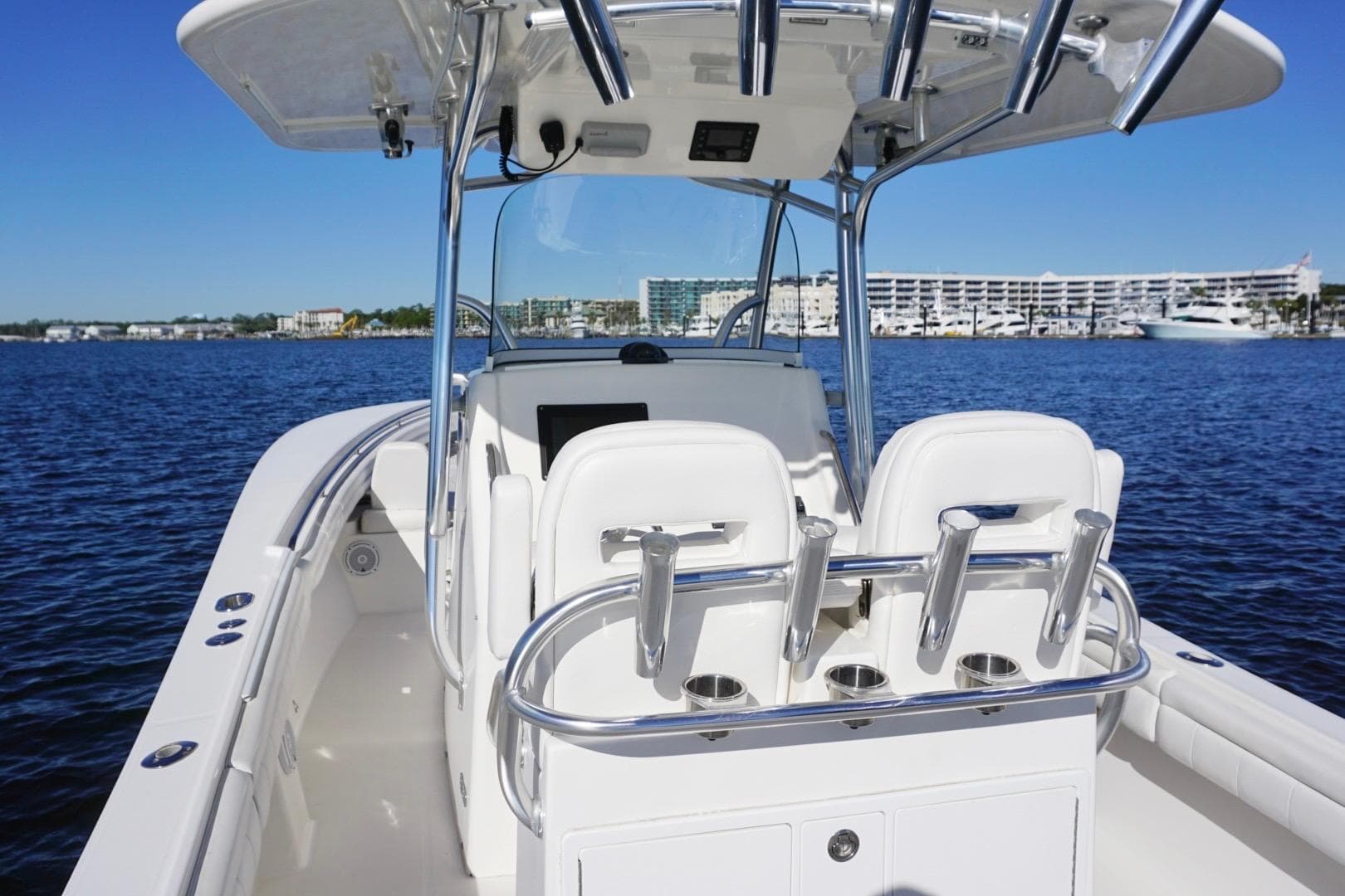 2018 Regulator 28 boat on water, featuring sleek design and modern amenities.