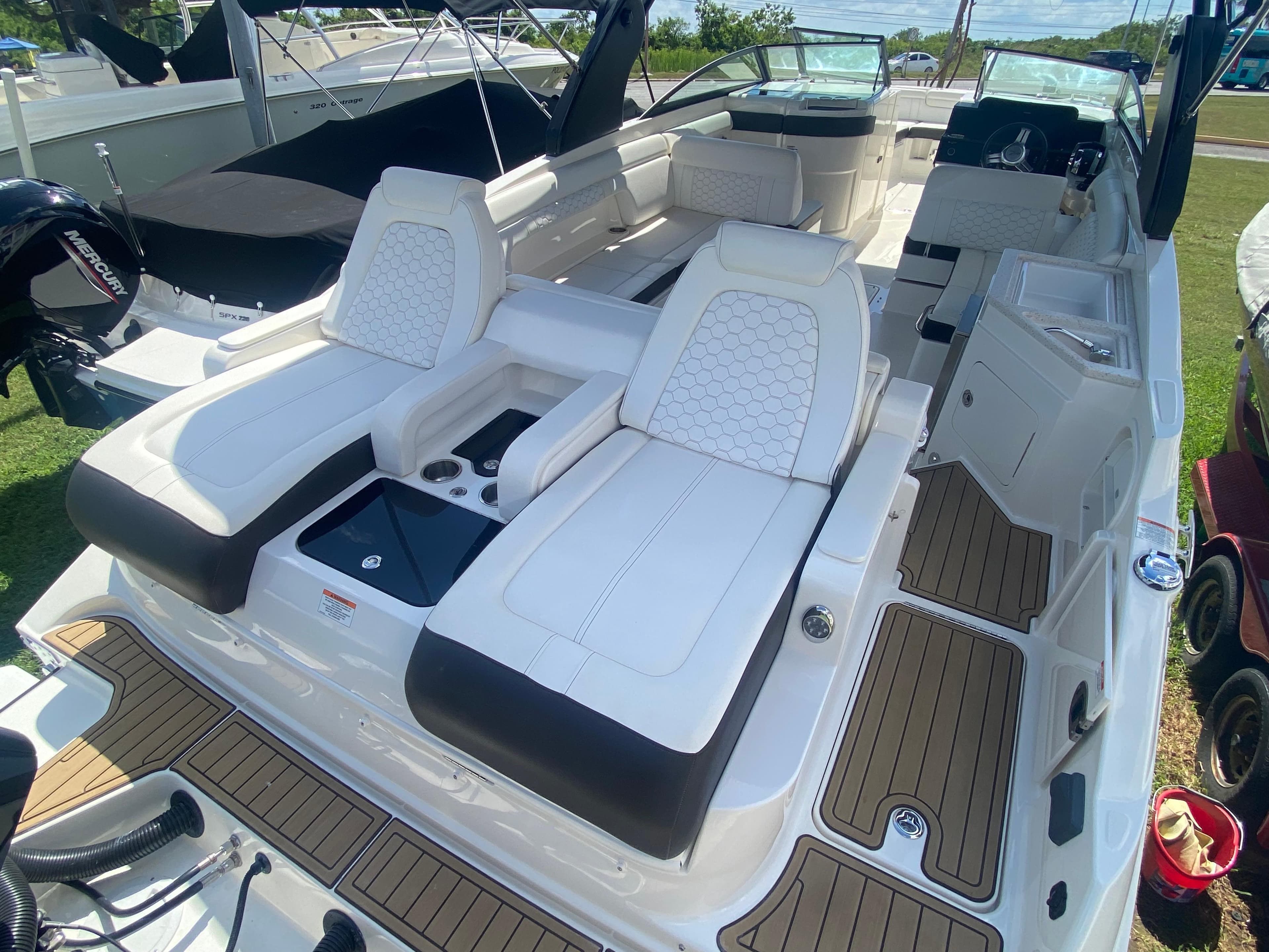 2020 Sea Ray SDX 290 Outboard boat with luxurious seating and modern design.