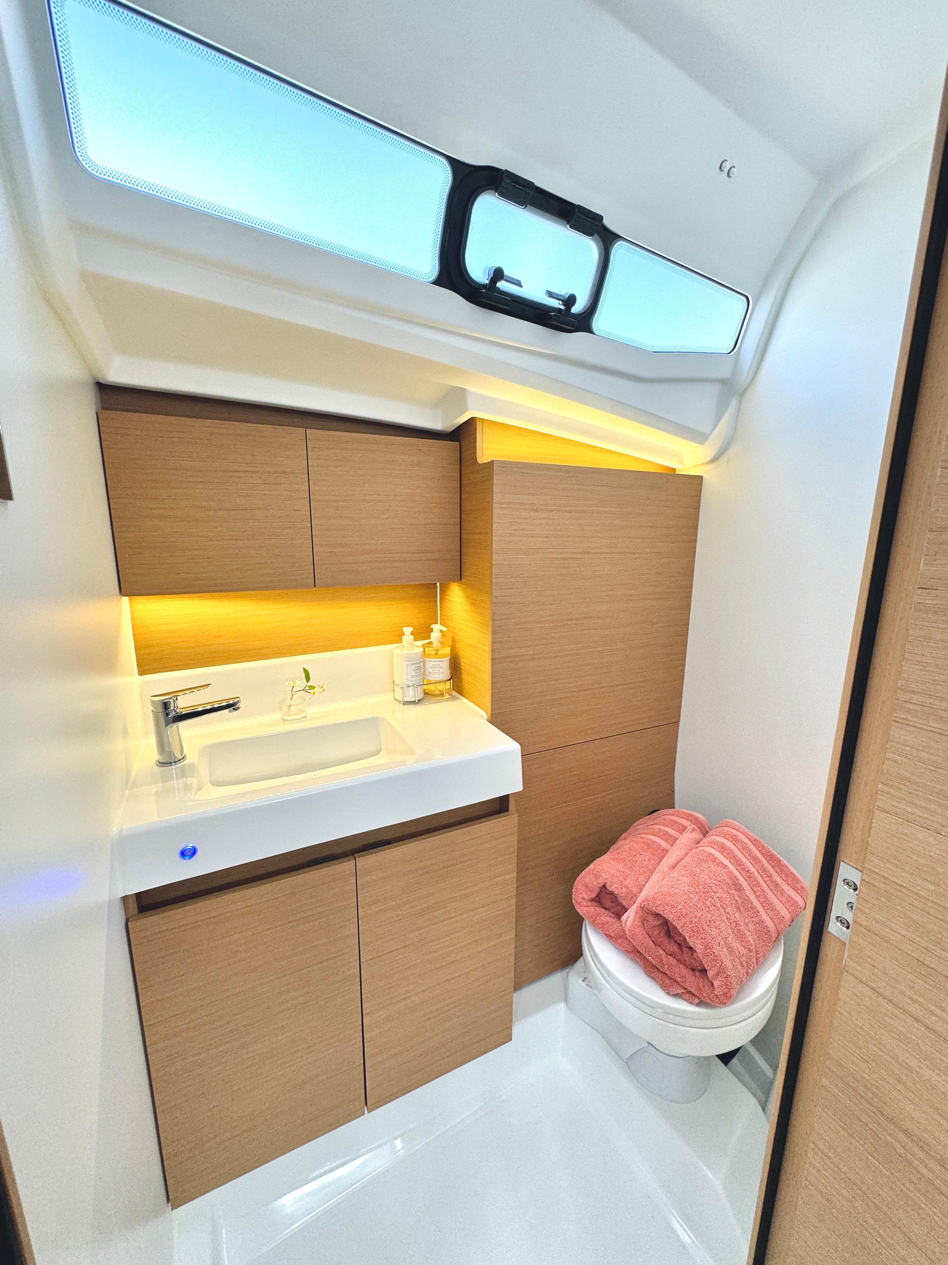 Modern bathroom of Jeanneau Sun Odyssey 380 yacht, year 2023.