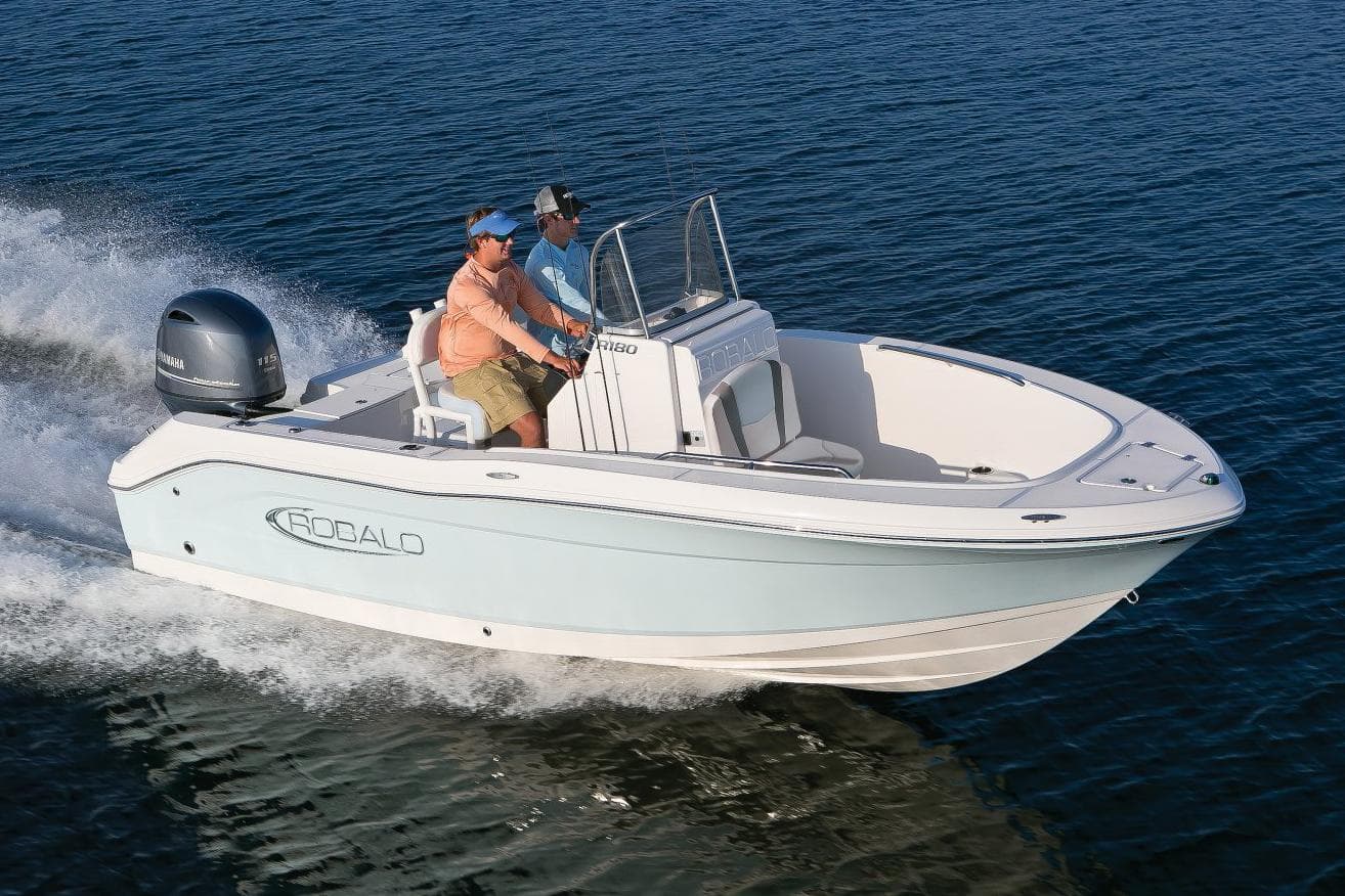 Manufacturer Provided Image: 2025 Robalo R180 Center Console boat cruising on open water.