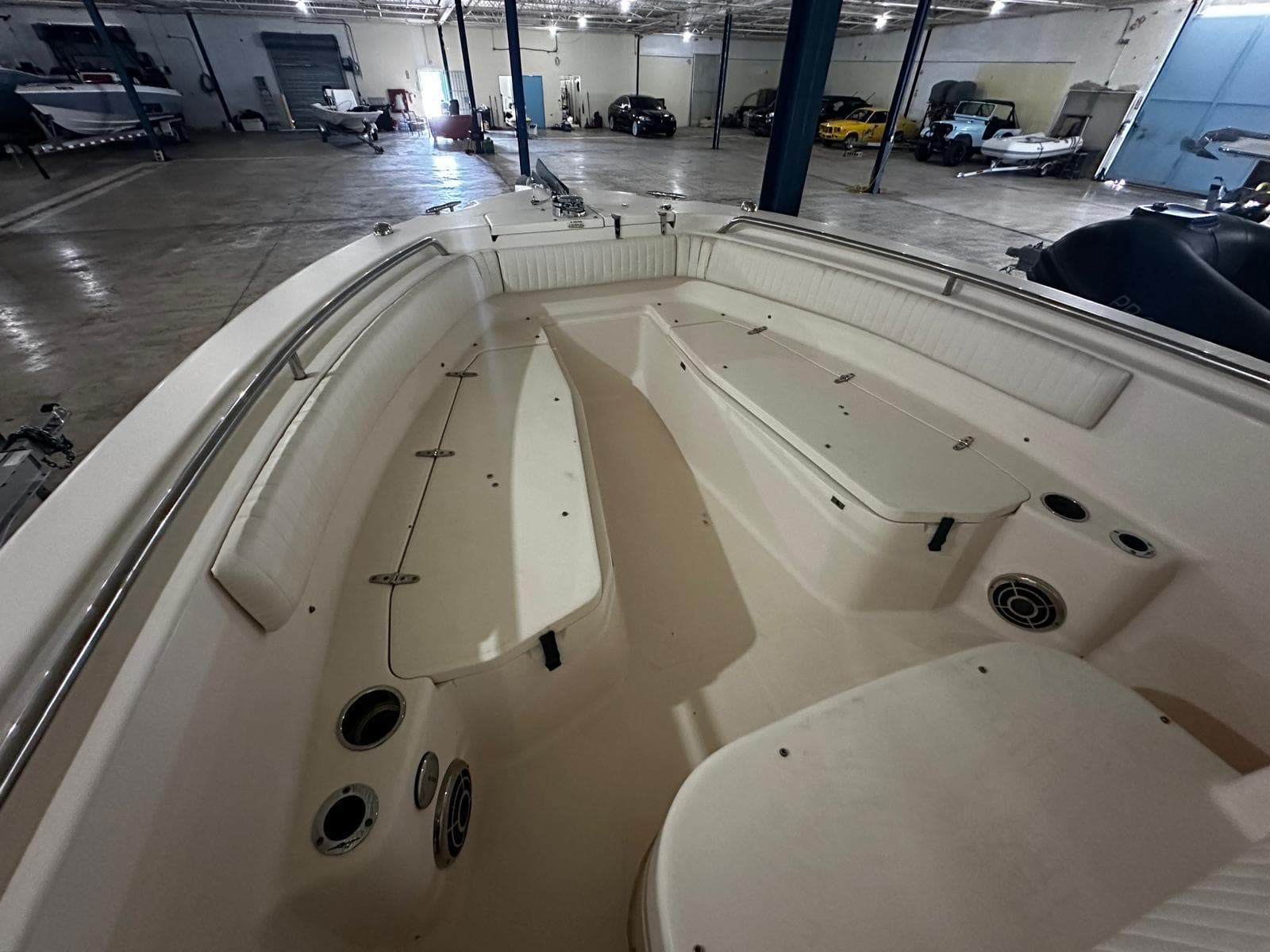 2014 Grady-White Fisherman 257 boat interior in a spacious warehouse setting.