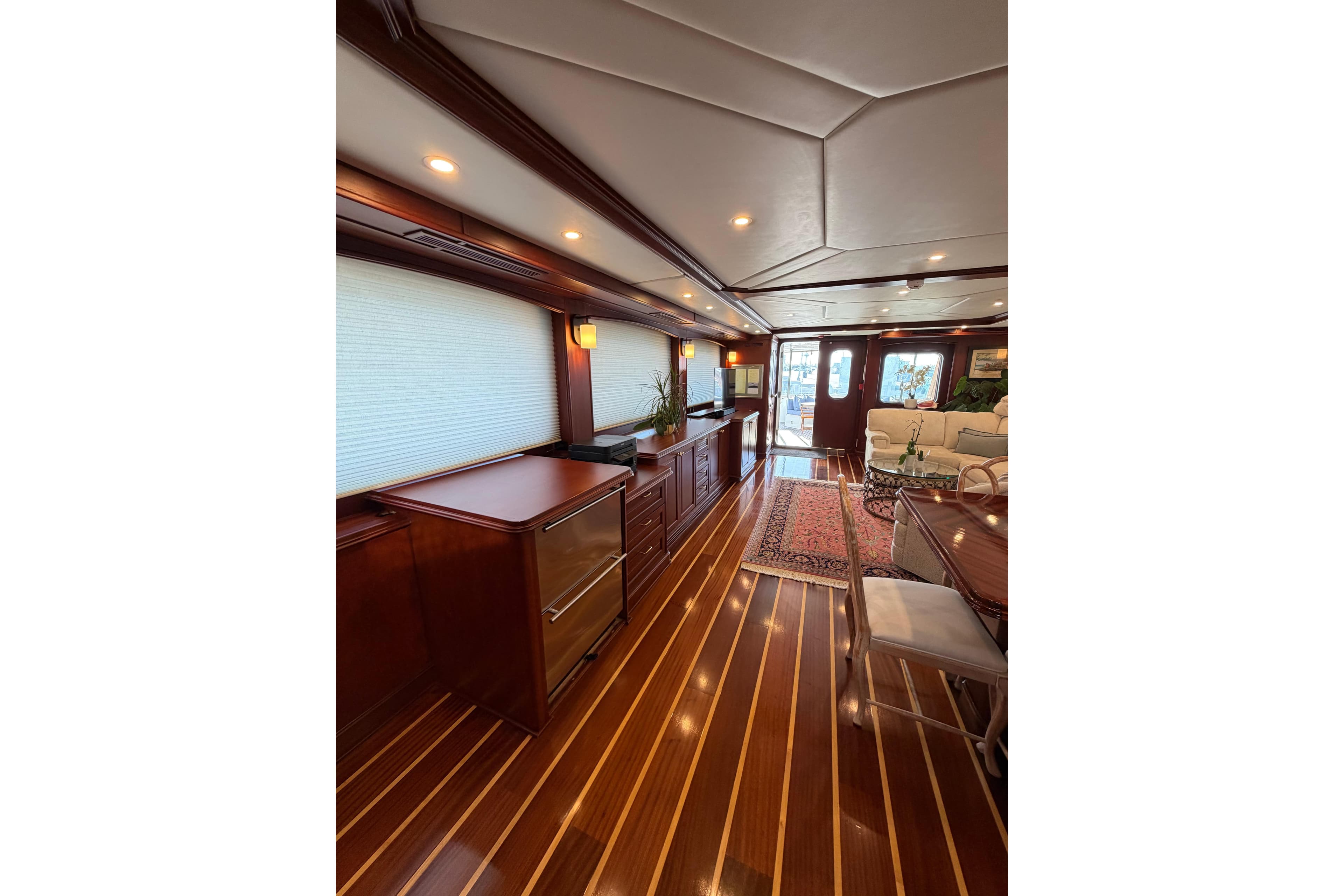 Luxurious interior of 2001 Doogersbank Vipack yacht with elegant wood flooring and modern furnishings.
