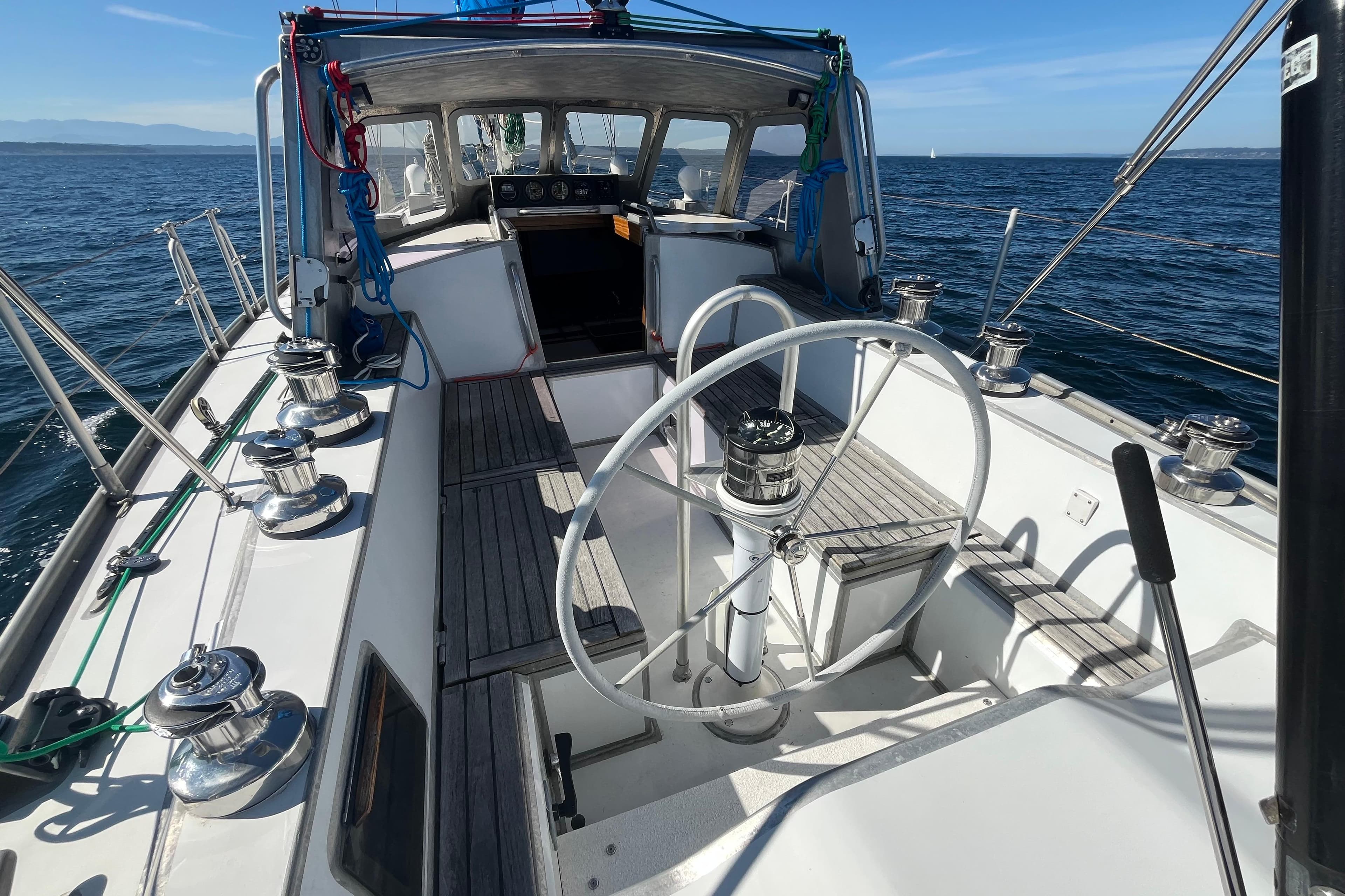 Lavranos 43 sailboat cockpit, 2010 model, featuring steering wheel and winches on open sea.
