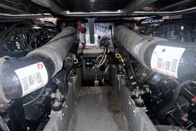 Engine room of a 1996 Sea Ray 400 Express Cruiser with MerCruiser components.