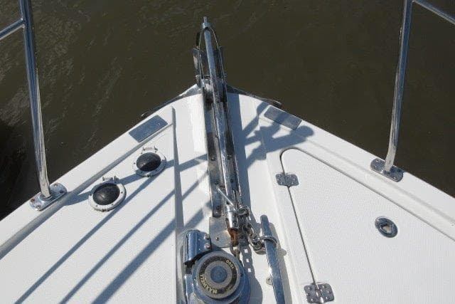 Bow of 2008 Carver 47 Motor Yacht with anchor and deck fittings.