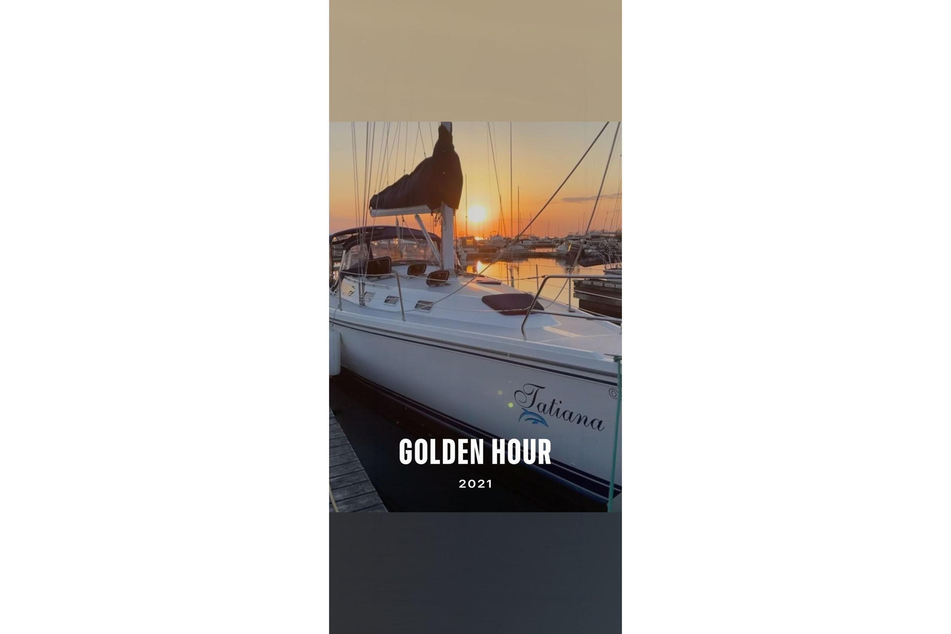 Catalina 42 MkII sailboat at sunset, docked in marina, 2021.