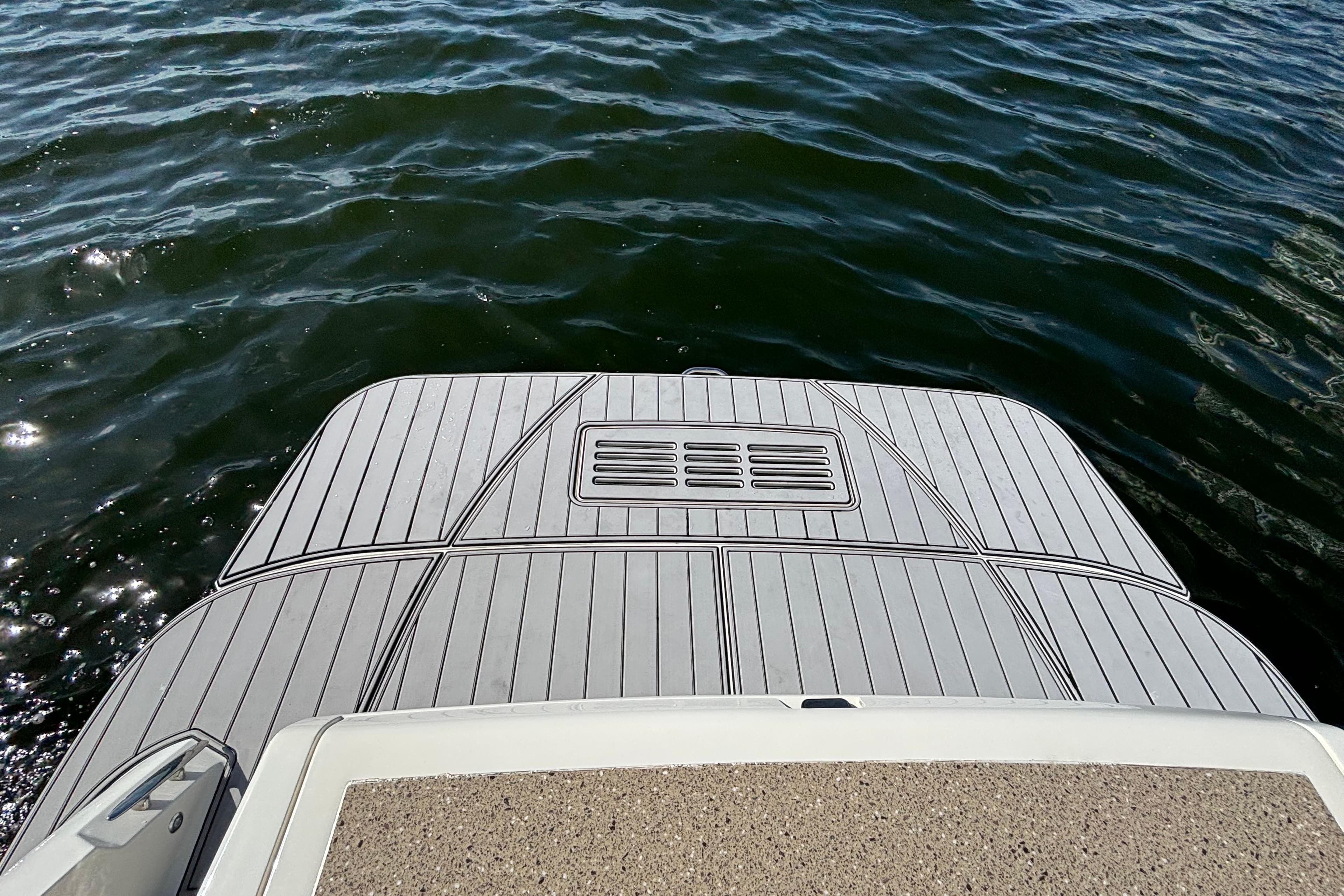 2016 Sea Ray 350 Sundancer swim platform on calm water.
