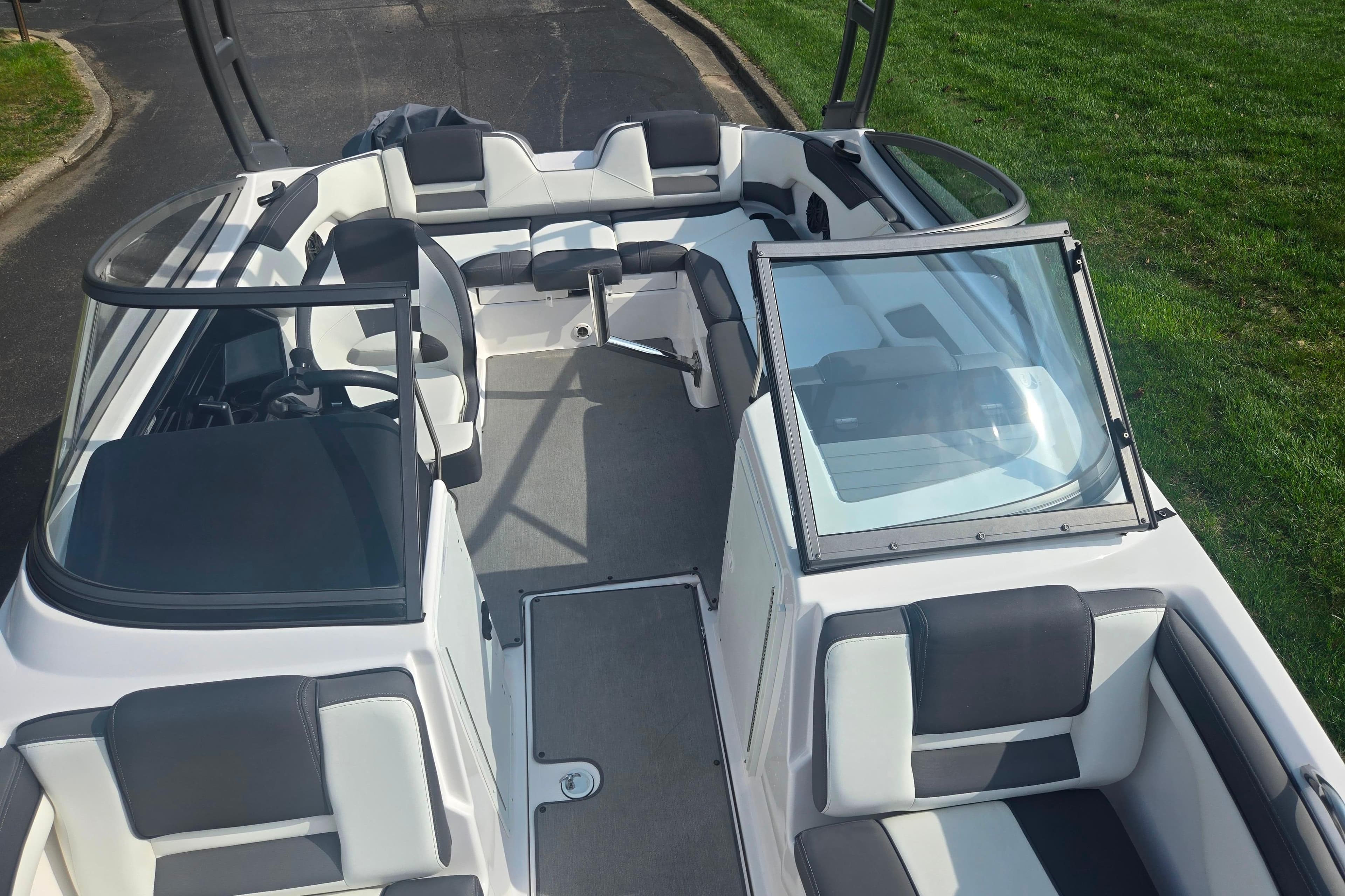 2022 Yamaha Boats AR210 interior with sleek seating and modern design.