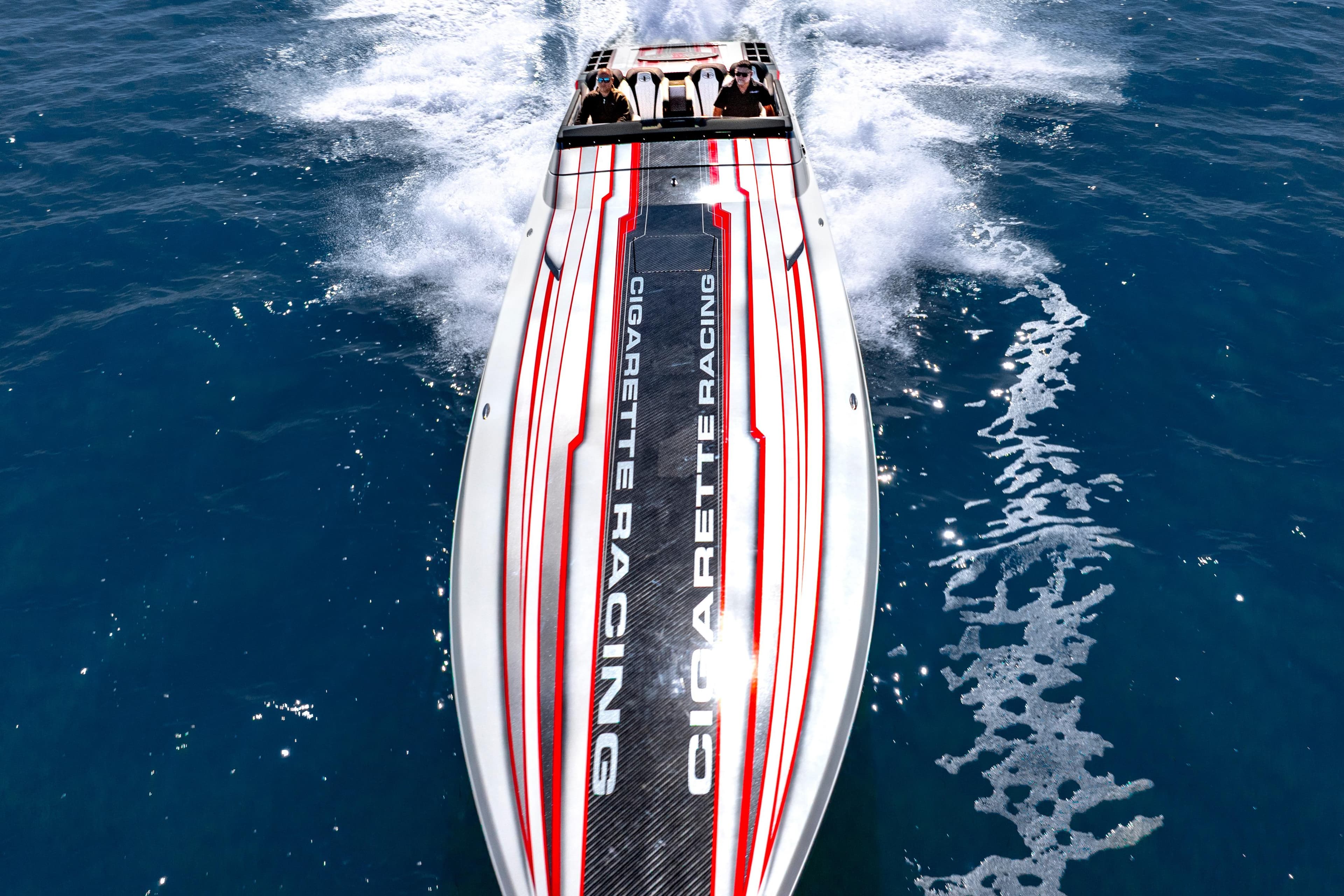 2020 Cigarette 515 racing boat speeding on open water, top view.