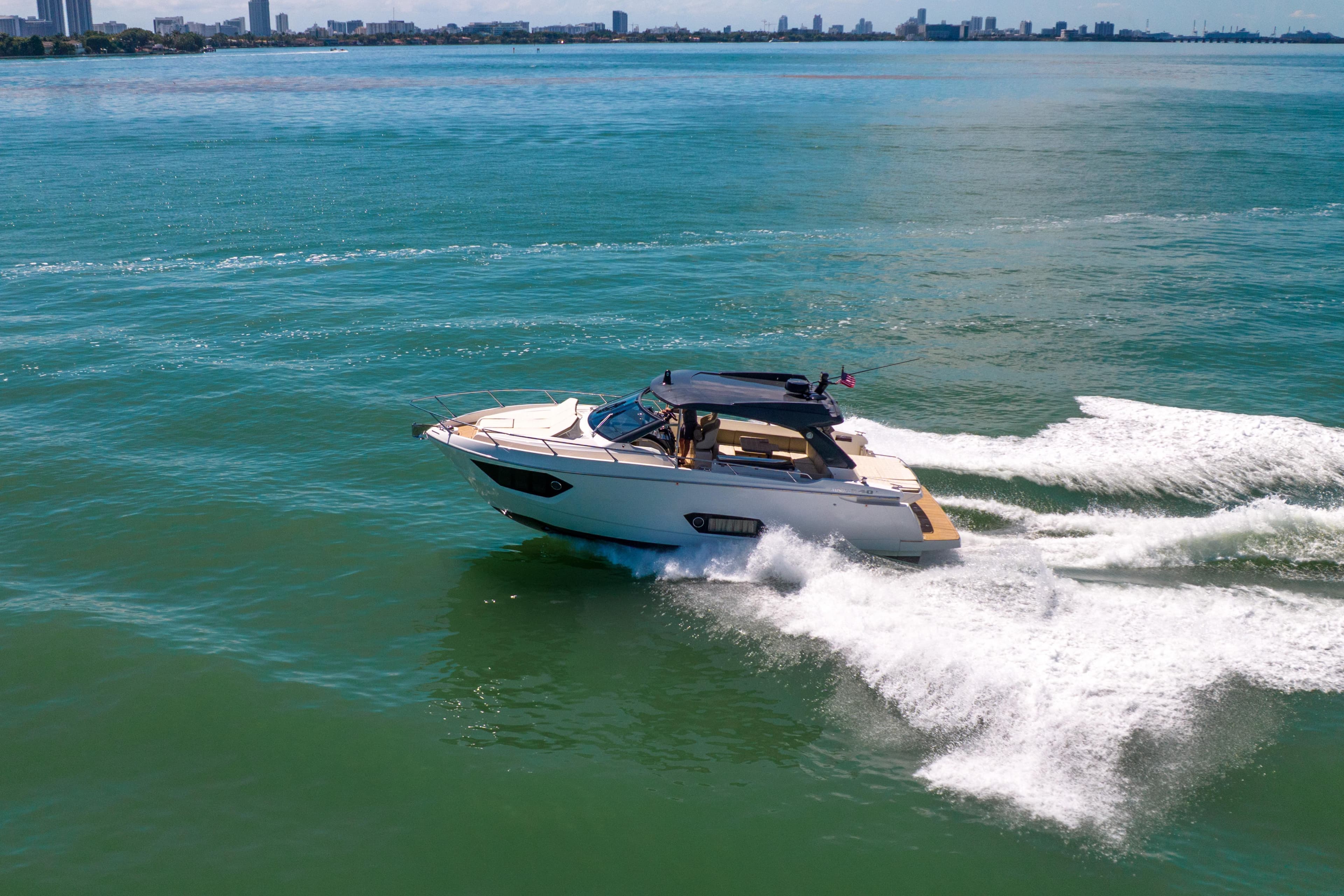 Luxury Absolute 40 STL yacht cruising on open water, 2017 model.