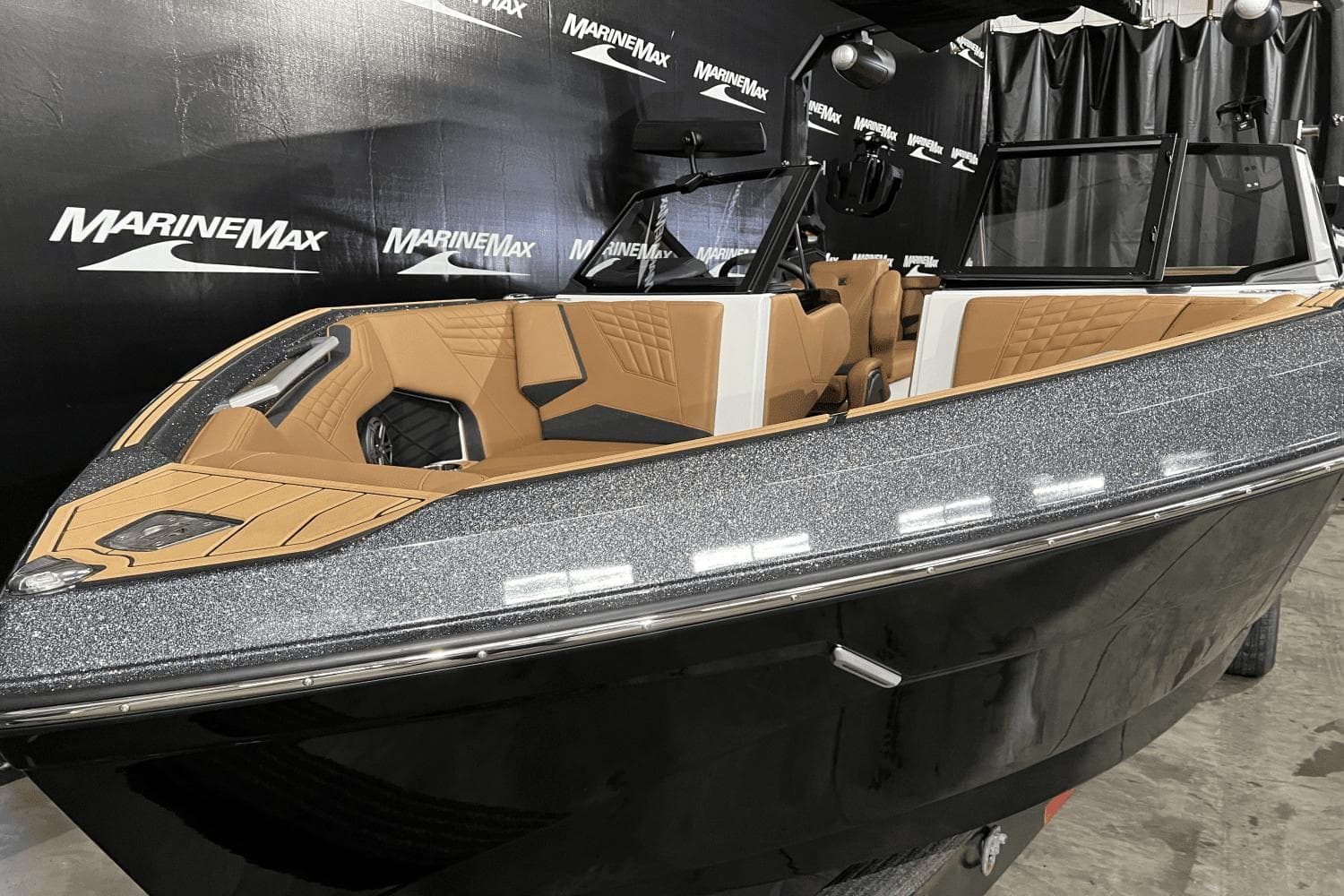 2023 Nautique Super Air Nautique S25 boat with sleek design and luxurious interior.