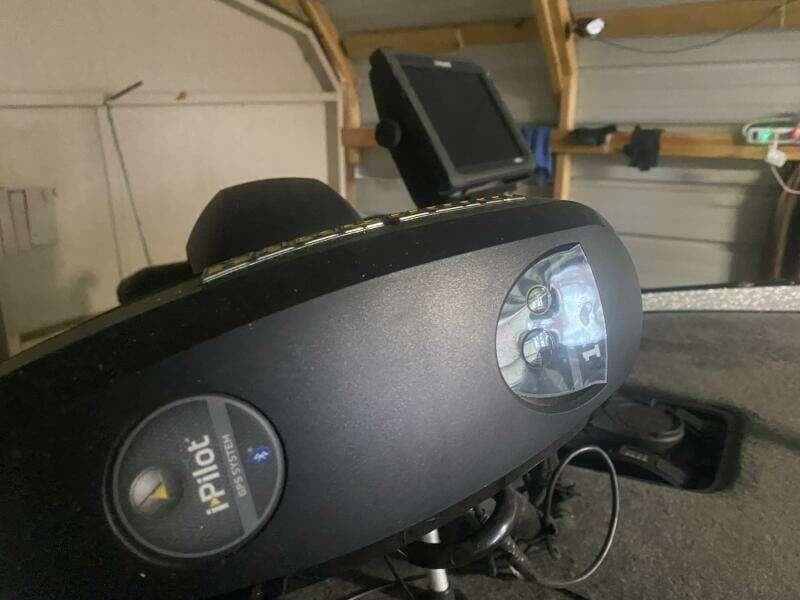 Triton 20 TRX Elite 2016 boat dashboard with iPilot system in a garage.