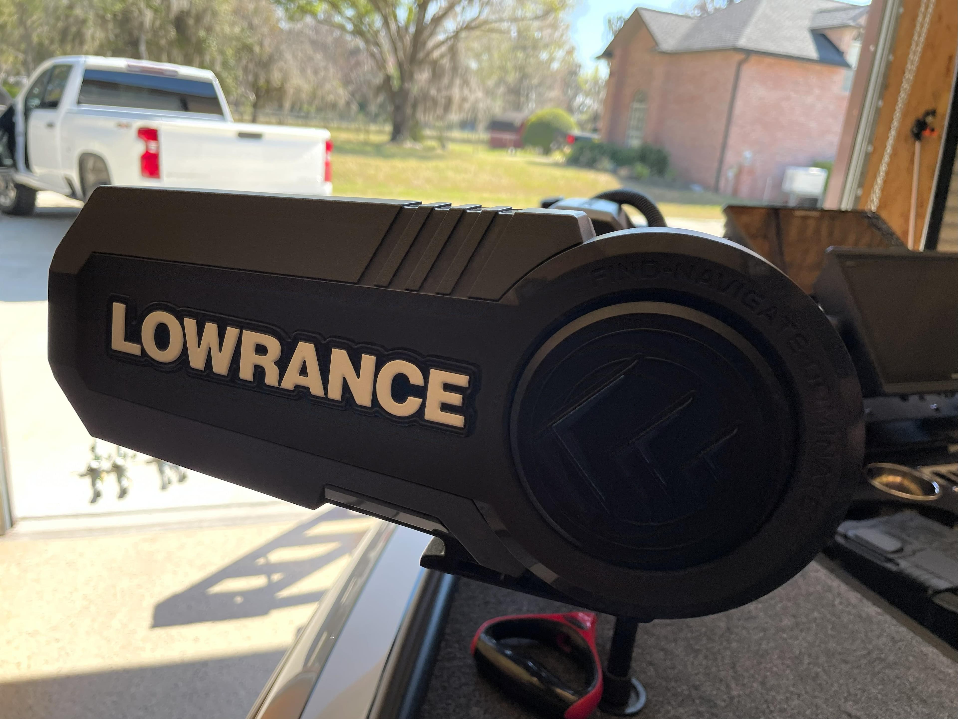 Lowrance device on 2023 Ranger Z520R 55th Anniversary Limited Edition boat, outdoor setting.