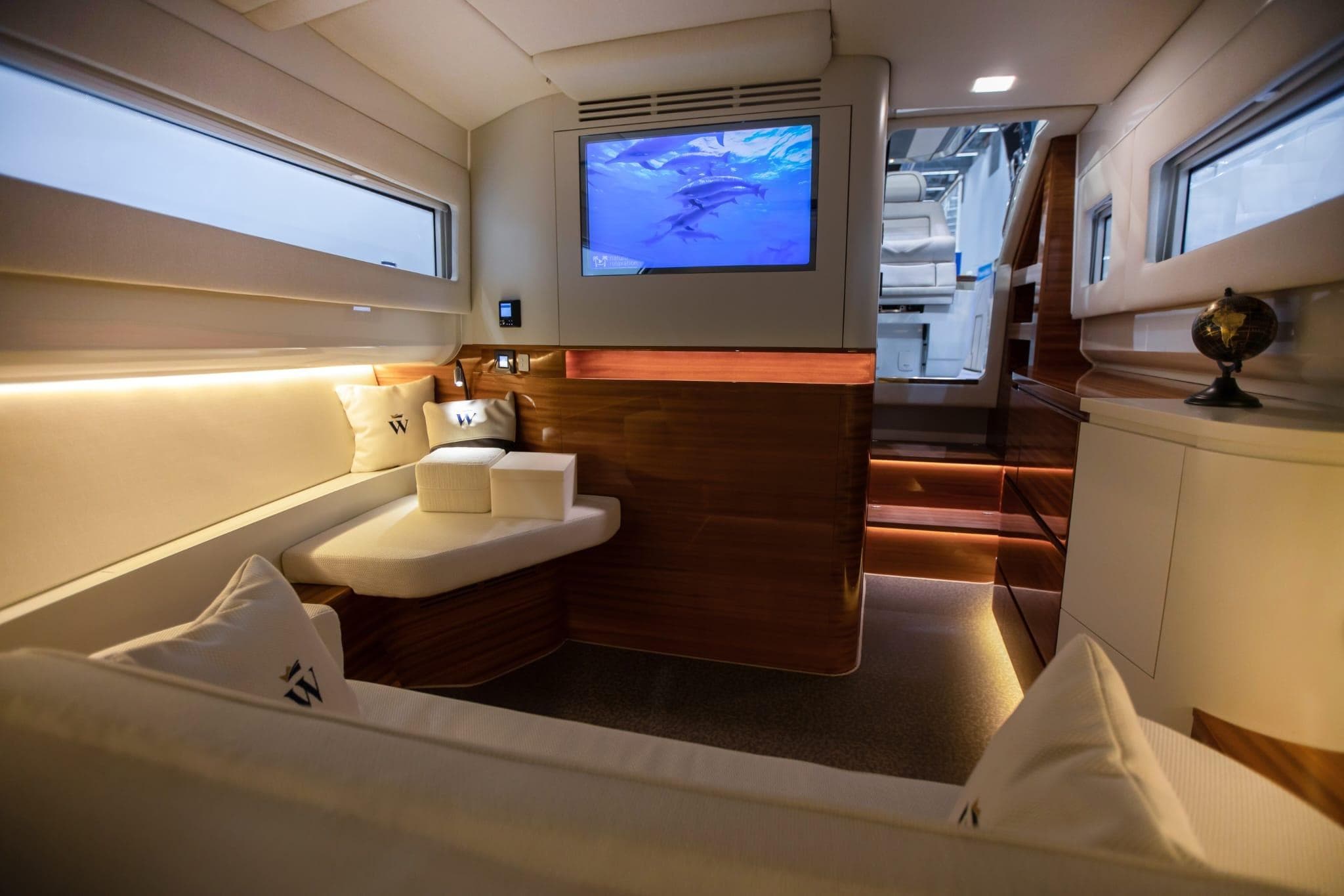 Luxurious interior of 2024 Wiszniewski Yachts W43, featuring elegant seating and modern design.