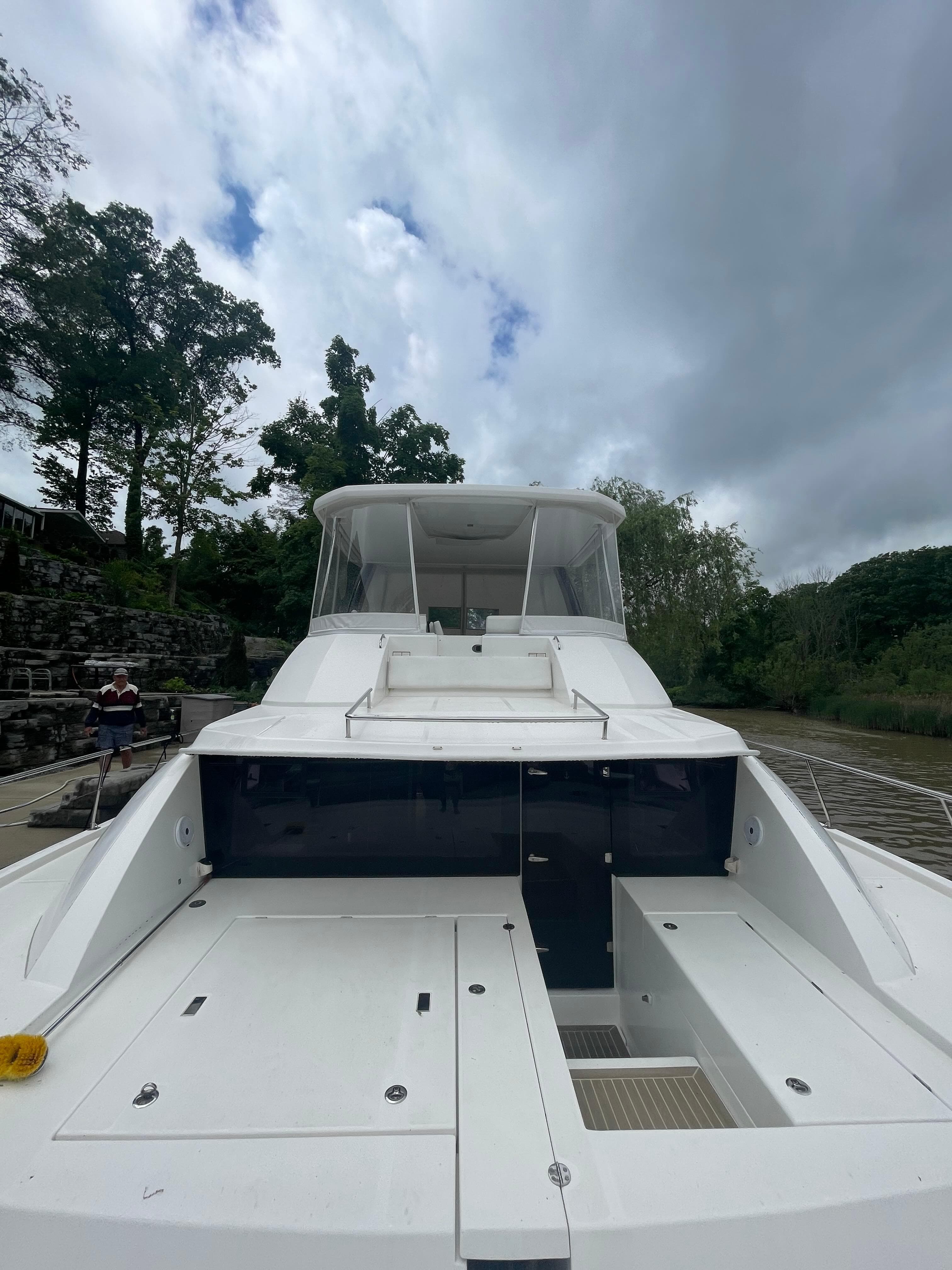 2020 Leopard 43 Powercat yacht docked under cloudy sky.
