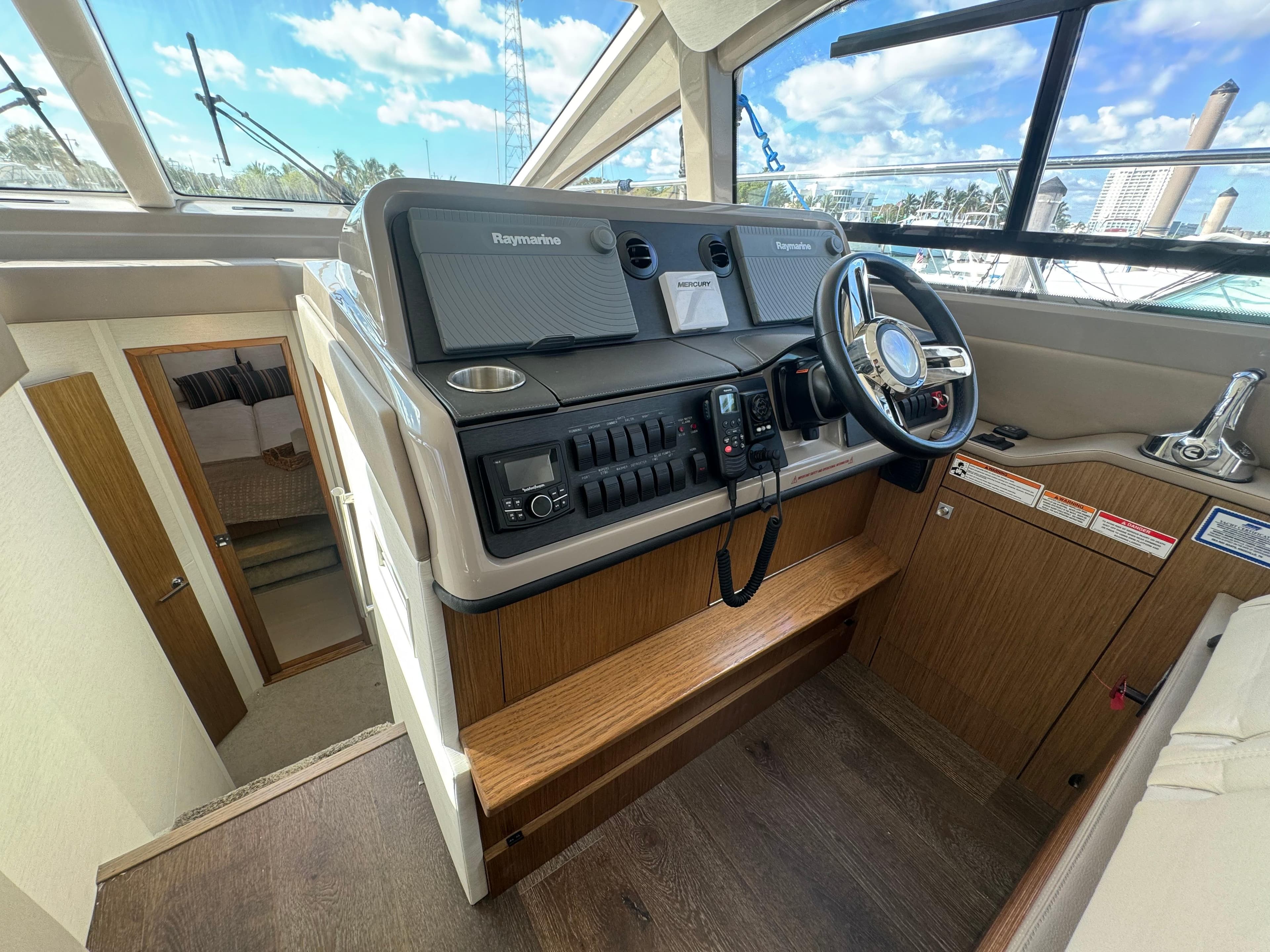 2017 Sea Ray Sundancer helm with modern controls and navigation equipment.