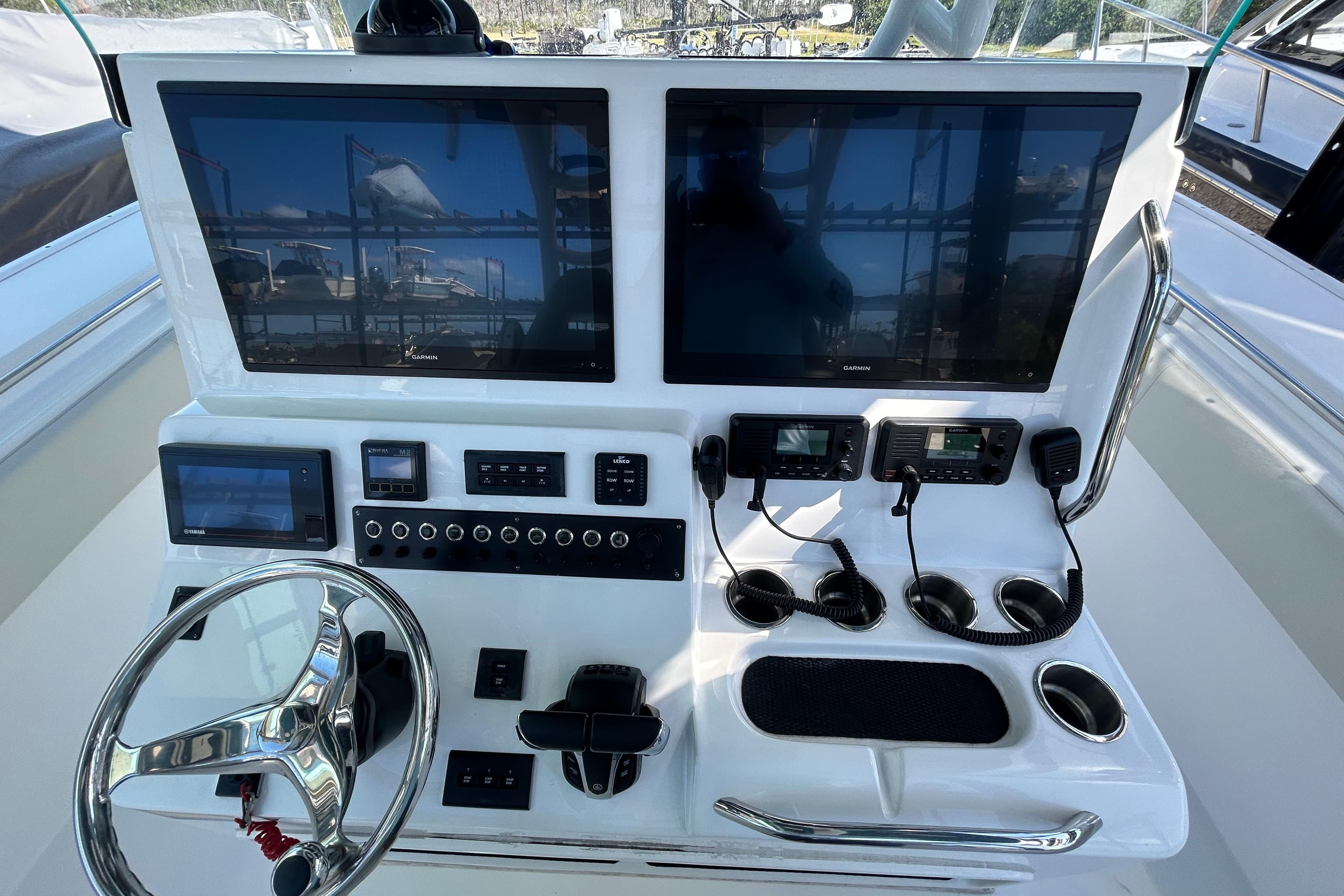 2022 Cape Horn 36 boat dashboard with dual Garmin displays and steering wheel.