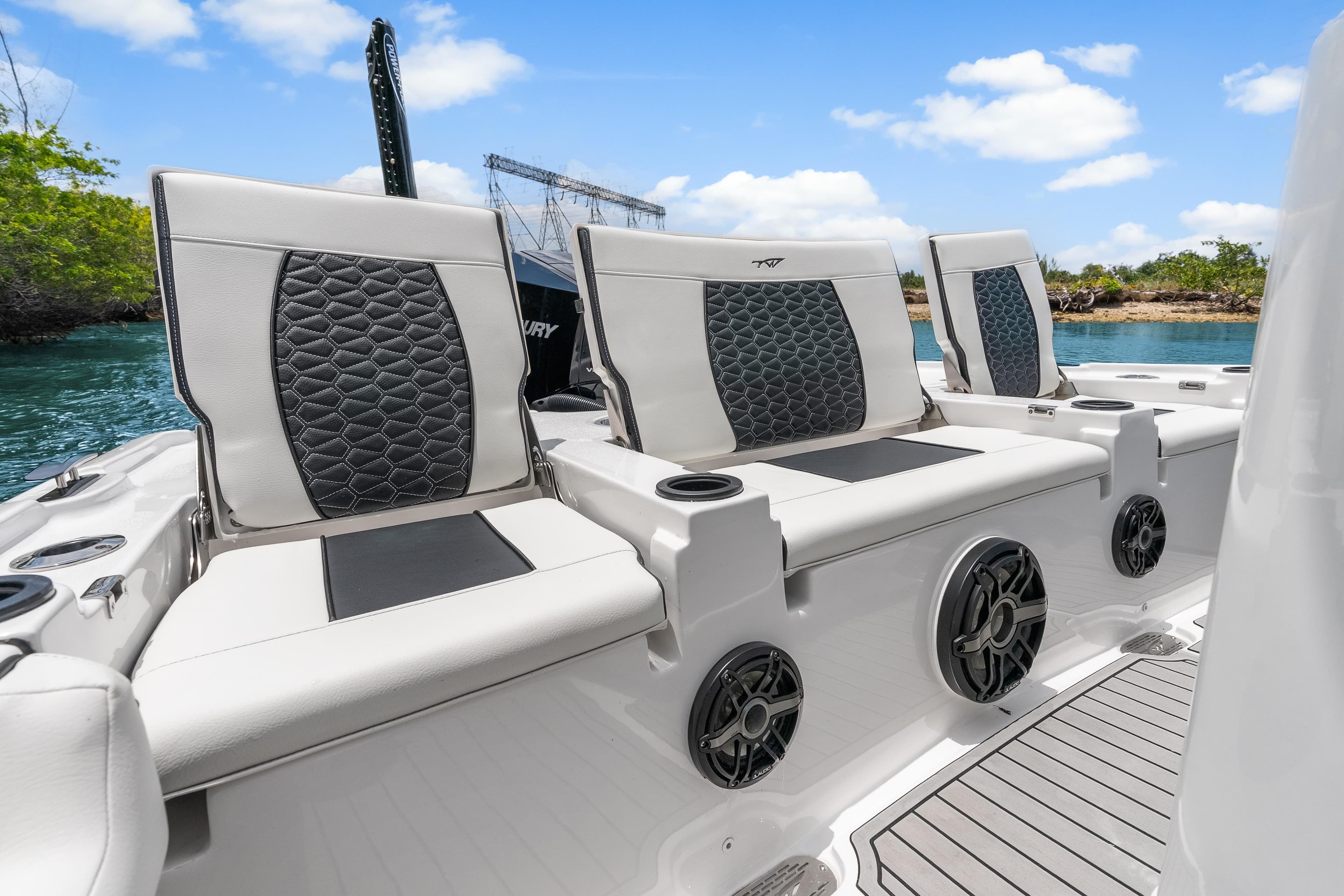 2026 Tidewater 2500 Carolina Bay boat seats with stylish upholstery and cup holders.