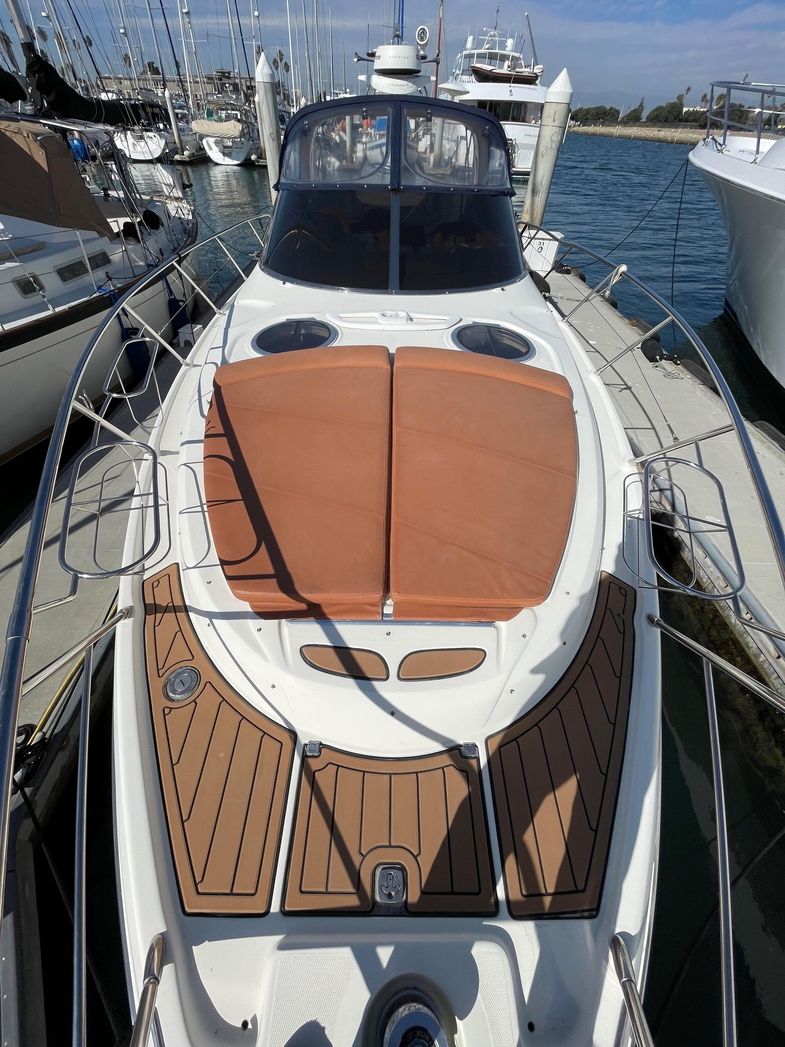 2004 Cranchi Endurance 41 boat docked at marina.