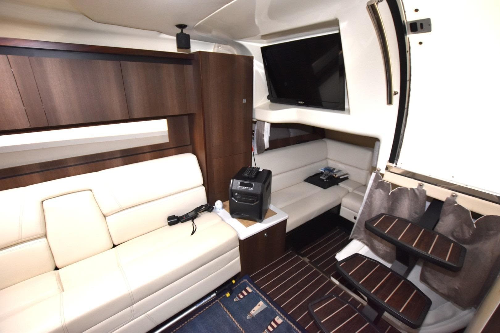 Luxurious interior of 2017 Monterey 355 Sport Yacht with plush seating and modern amenities.