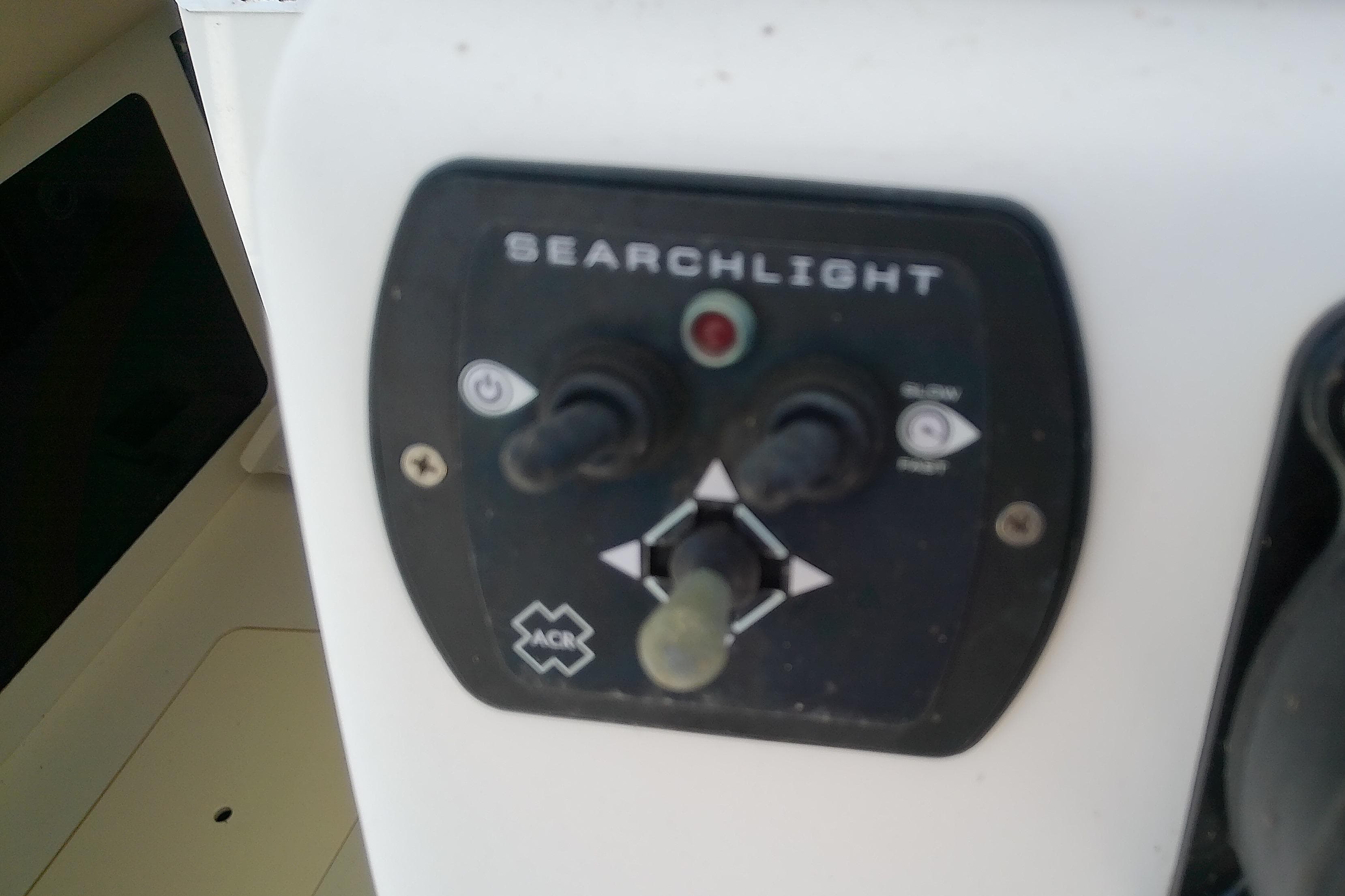 Control panel for searchlight on 2001 Boston Whaler 28 Outrage boat.