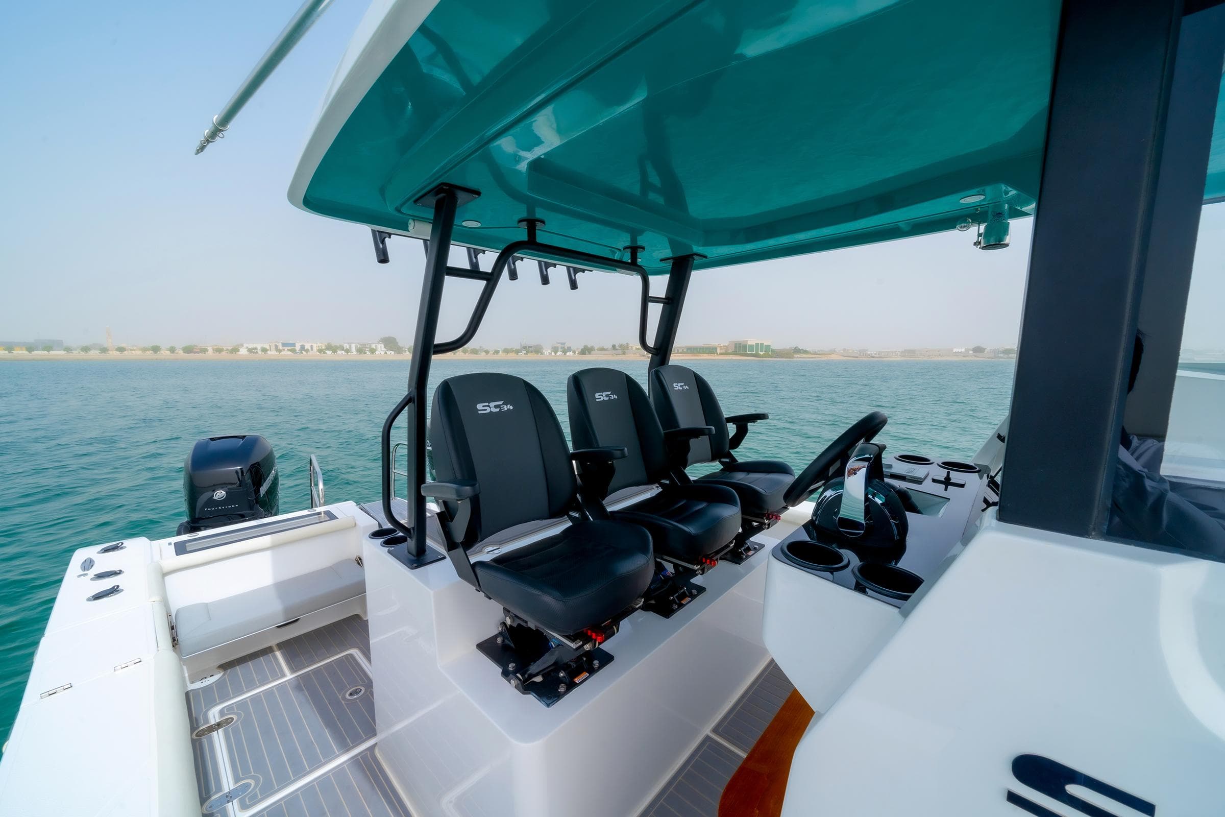 2025 SilverCAT 34 CC boat interior with modern seating and controls on open water.