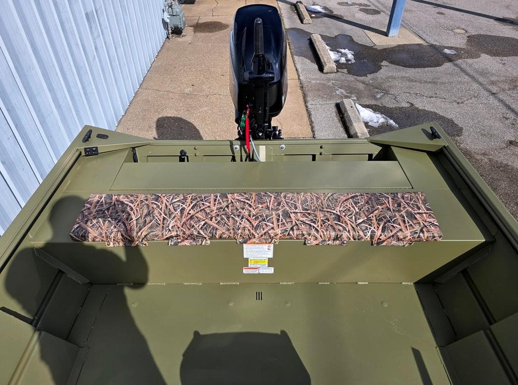 Optional stern snap down seat pad & aft storage door